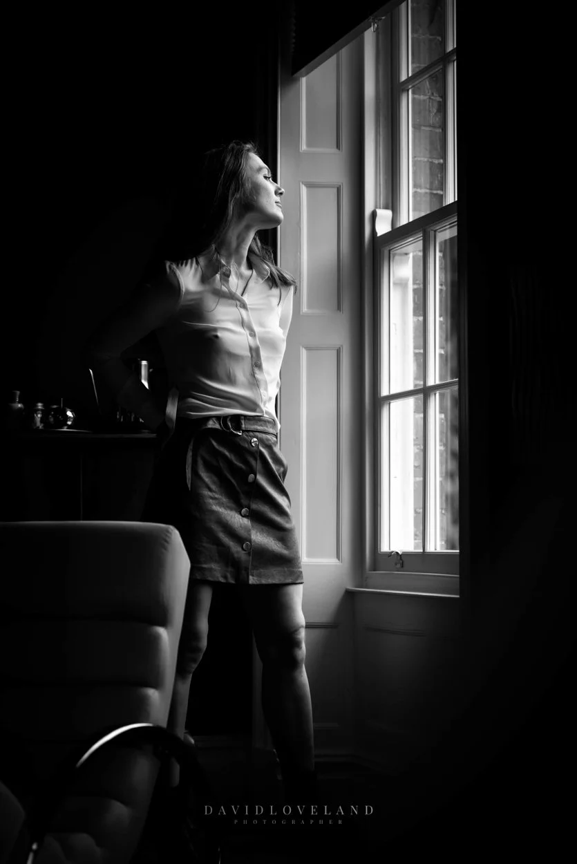 Model Emma Ross in Karen Millen cream blouse and Karen Millen tan leather mini skirt. Eithiniog Hall, natural light, David Loveland Fashion Photography 
