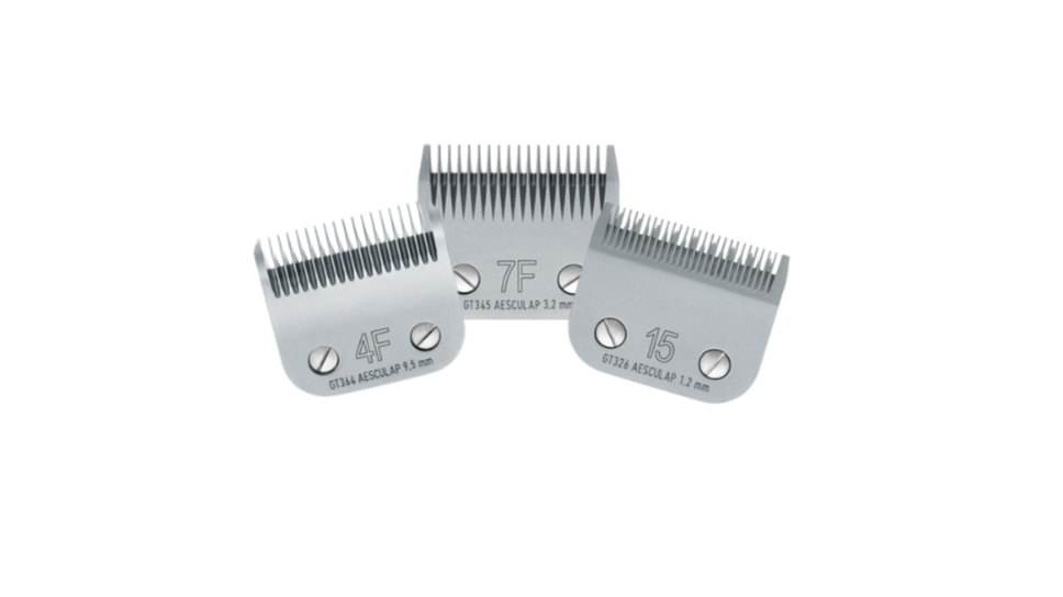 Three hair clipper blades of different sizes, labeled 4F, 7F, and 15, with measurements in millimeters.