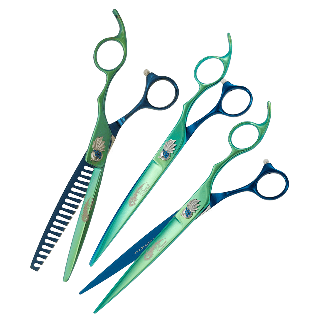 Set of three grooming shears with green and blue handles, decorated with an emblem of a bird and a crown.