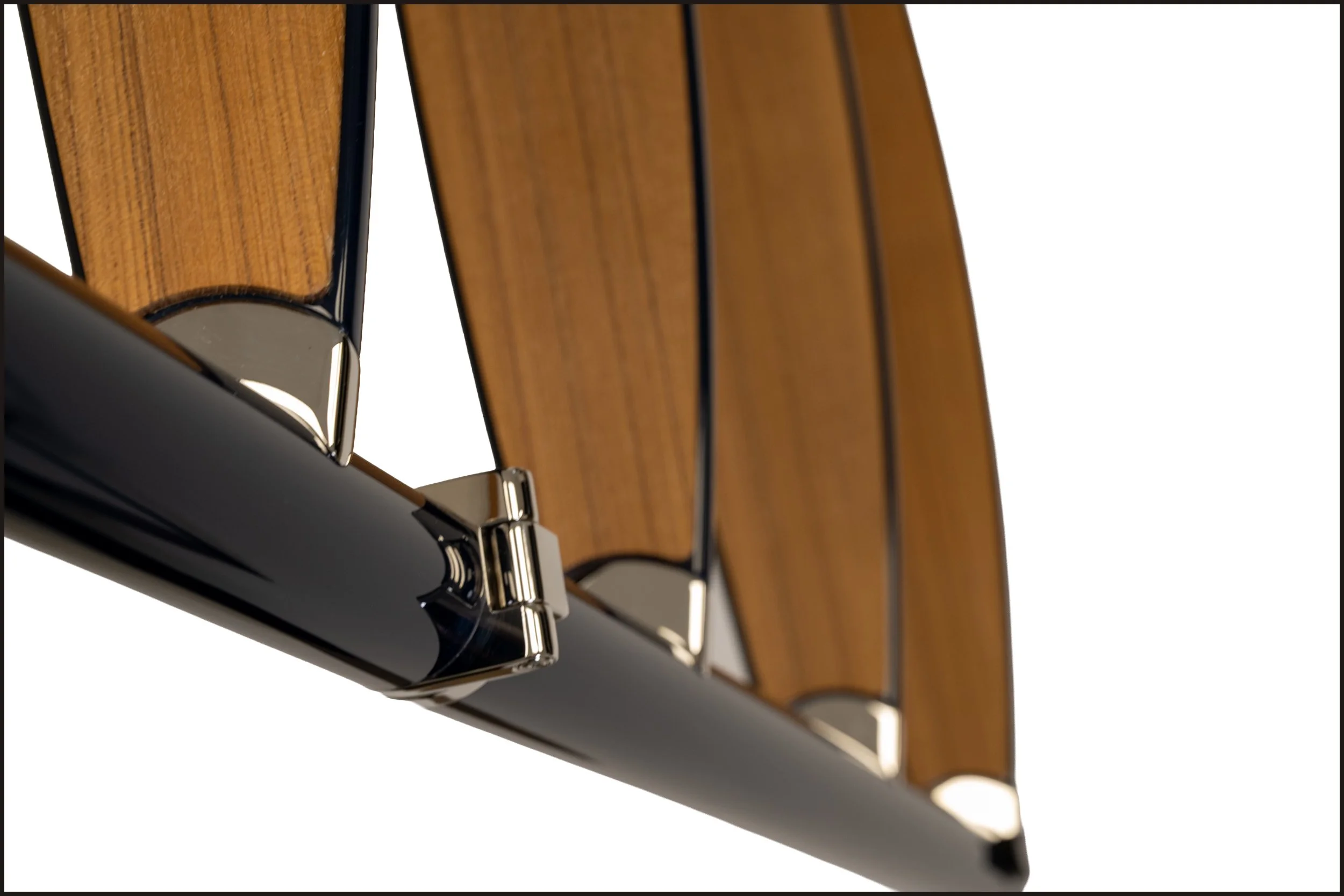 Carbon swim ladder from Bure Marine, showing teak treads and flag blue paint finish