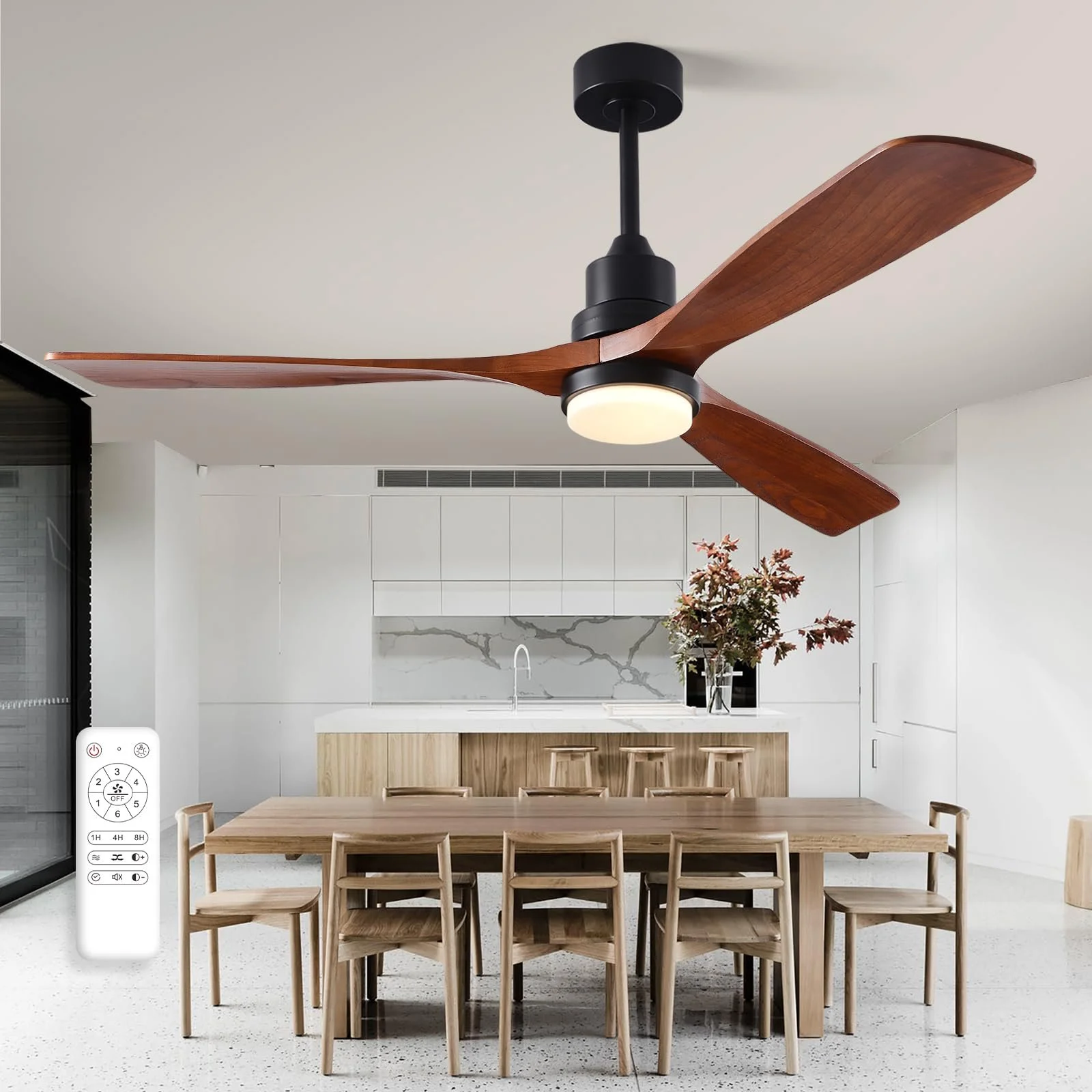 Modern kitchen and dining area with a wooden dining table, ten matching chairs, white cabinets, and a marble backsplash. A ceiling fan with wooden blades and an integrated light is above the table, and there is a remote control on the floor near a sliding glass door.