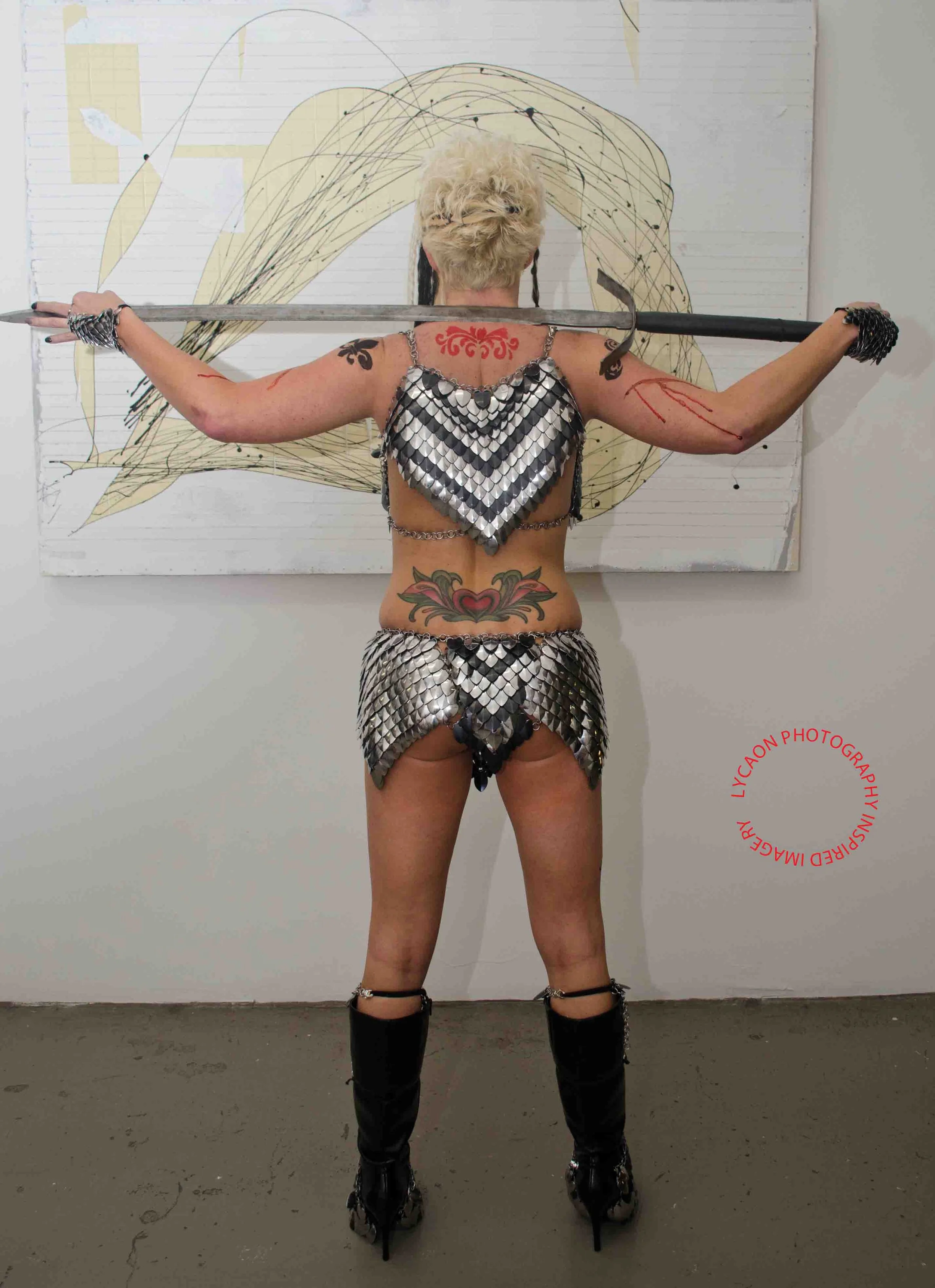 12
Outfit The Armorer 
Hair/makeup Jennifer Sullivan
Weapon Badger Blades