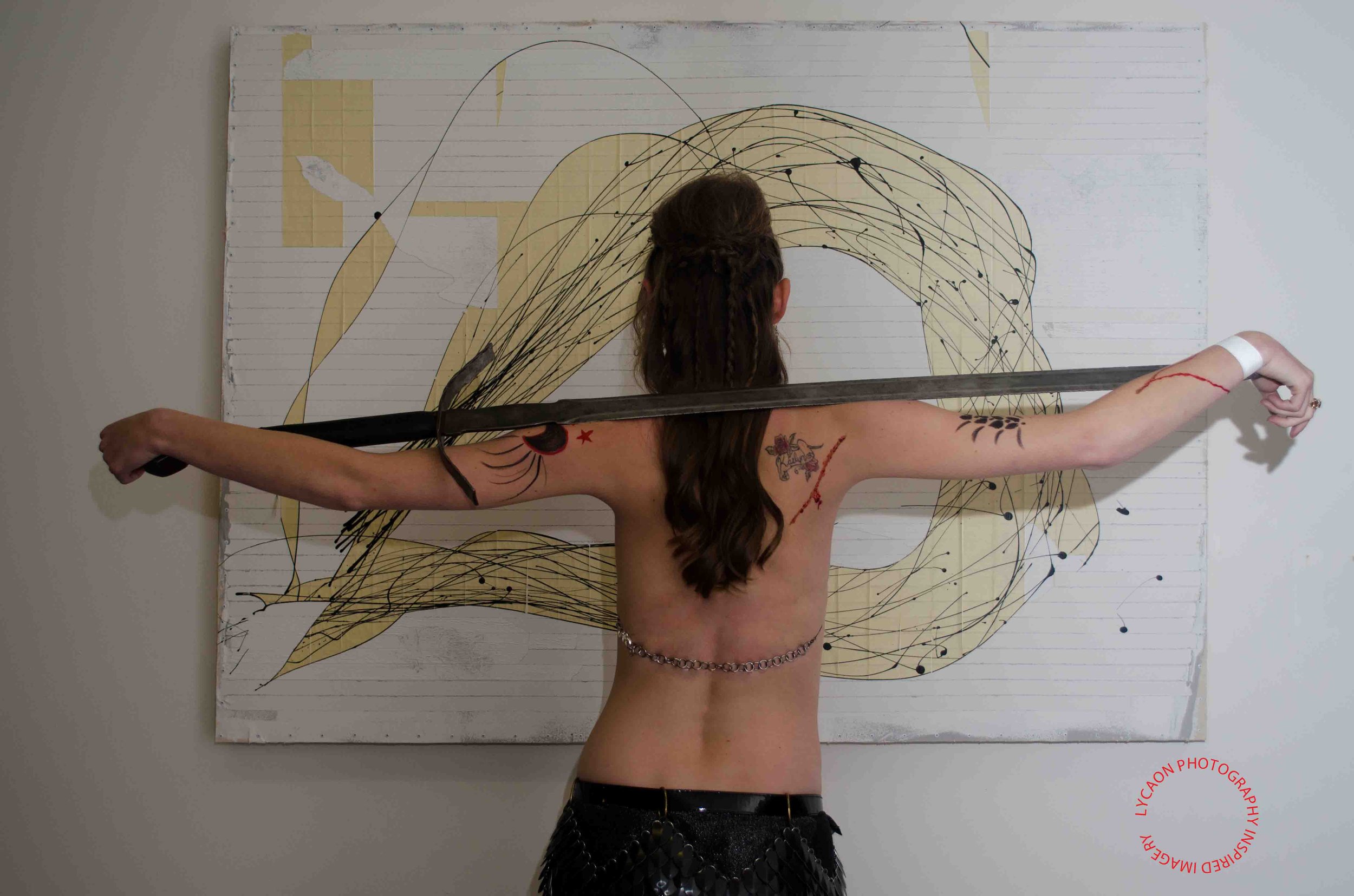 18
Model Jamie R. 
Outfit The Armorer 
Hair/makeup Jennifer Sullivan
Weapon Badger Blades