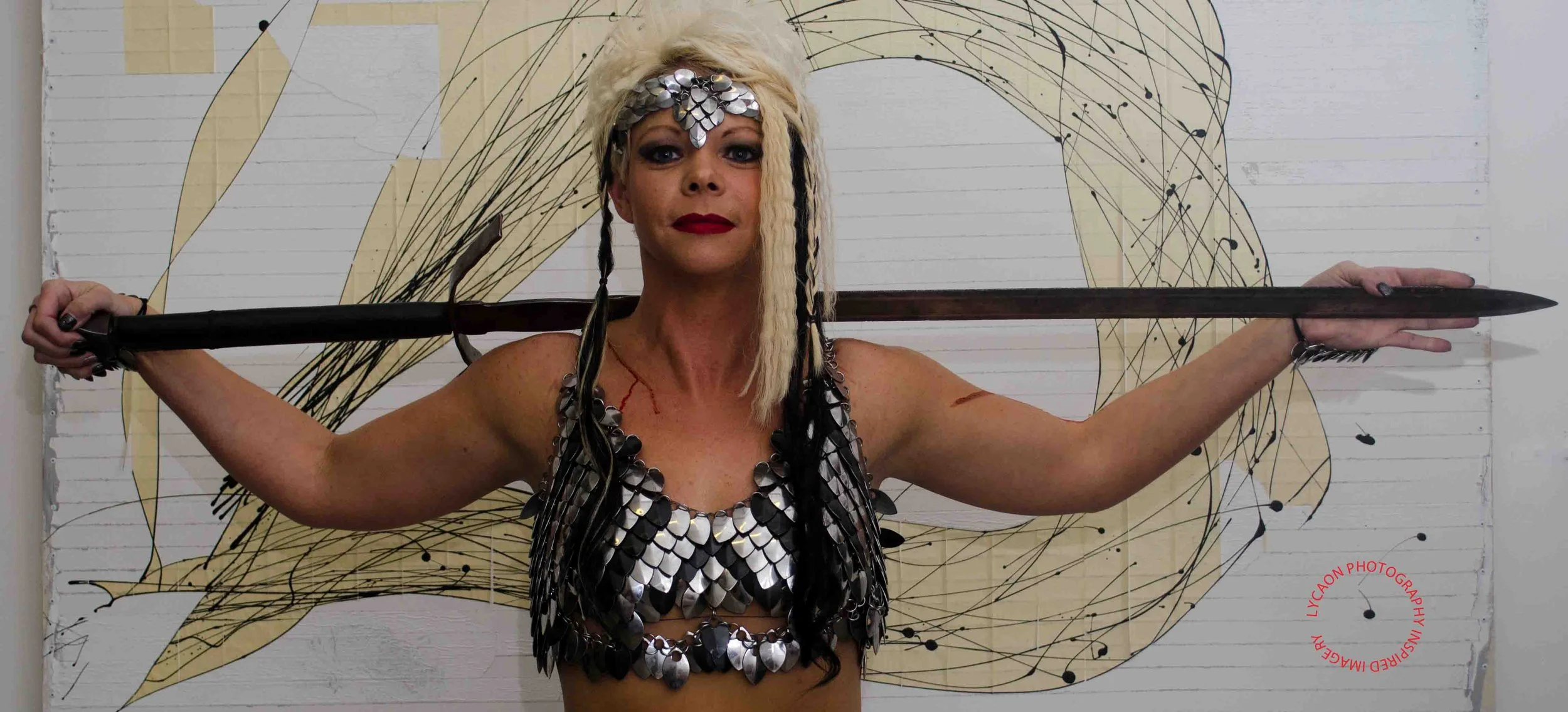 11
Outfit The Armorer 
Hair/makeup Jennifer Sullivan
Weapon Badger Blades