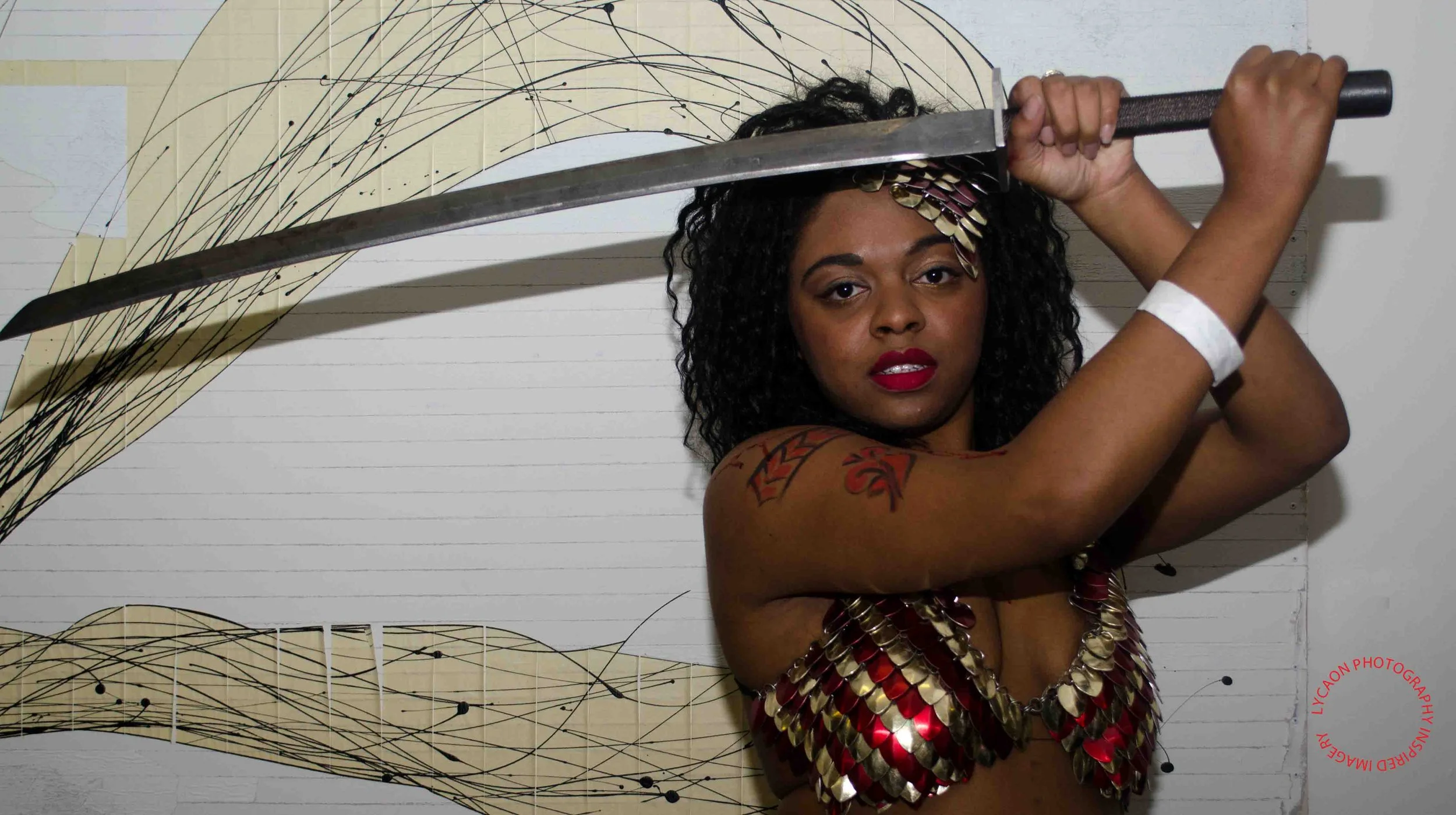 9
Outfit The Armorer 
Hair/makeup Jennifer Sullivan
Weapon Badger Blades