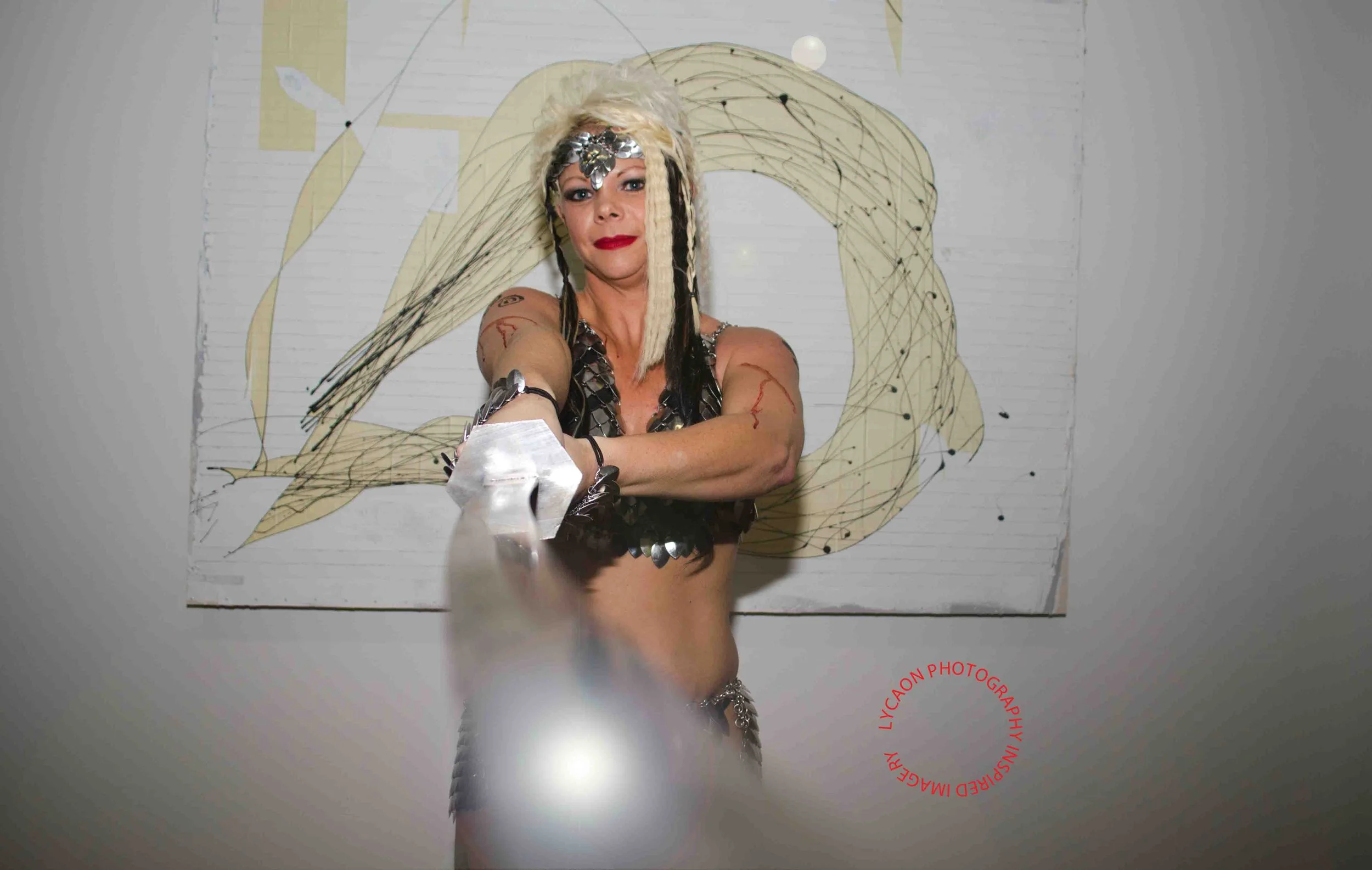 13
Outfit The Armorer 
Hair/makeup Jennifer Sullivan
Weapon Badger Blades