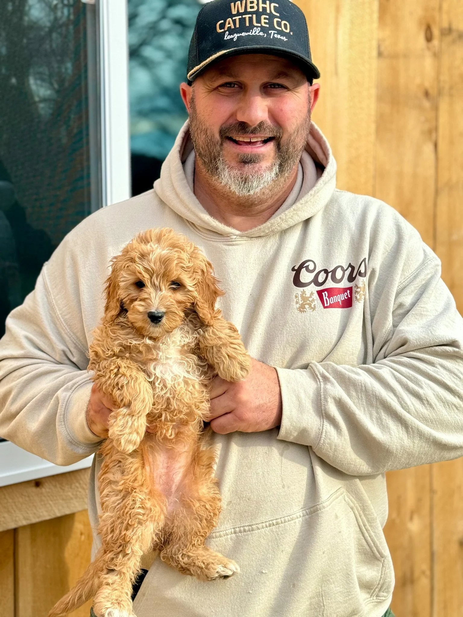 Rob with one of our cavapoo puppies dog breeder near me connecticut dog breeder cavapoos