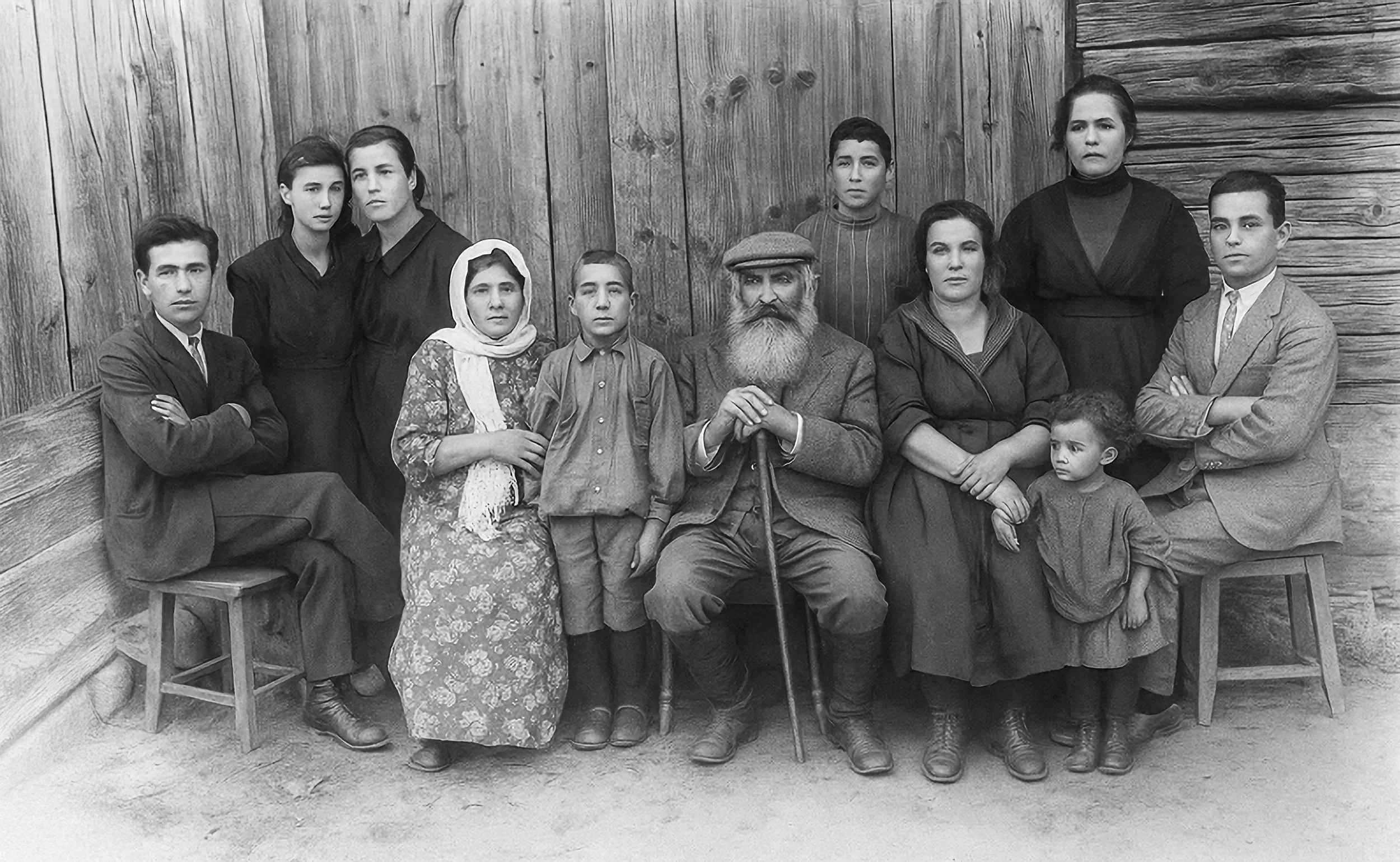 The Zandan Family circa 1900, black and white image of family of eleven with bearded patriarch, adults and children