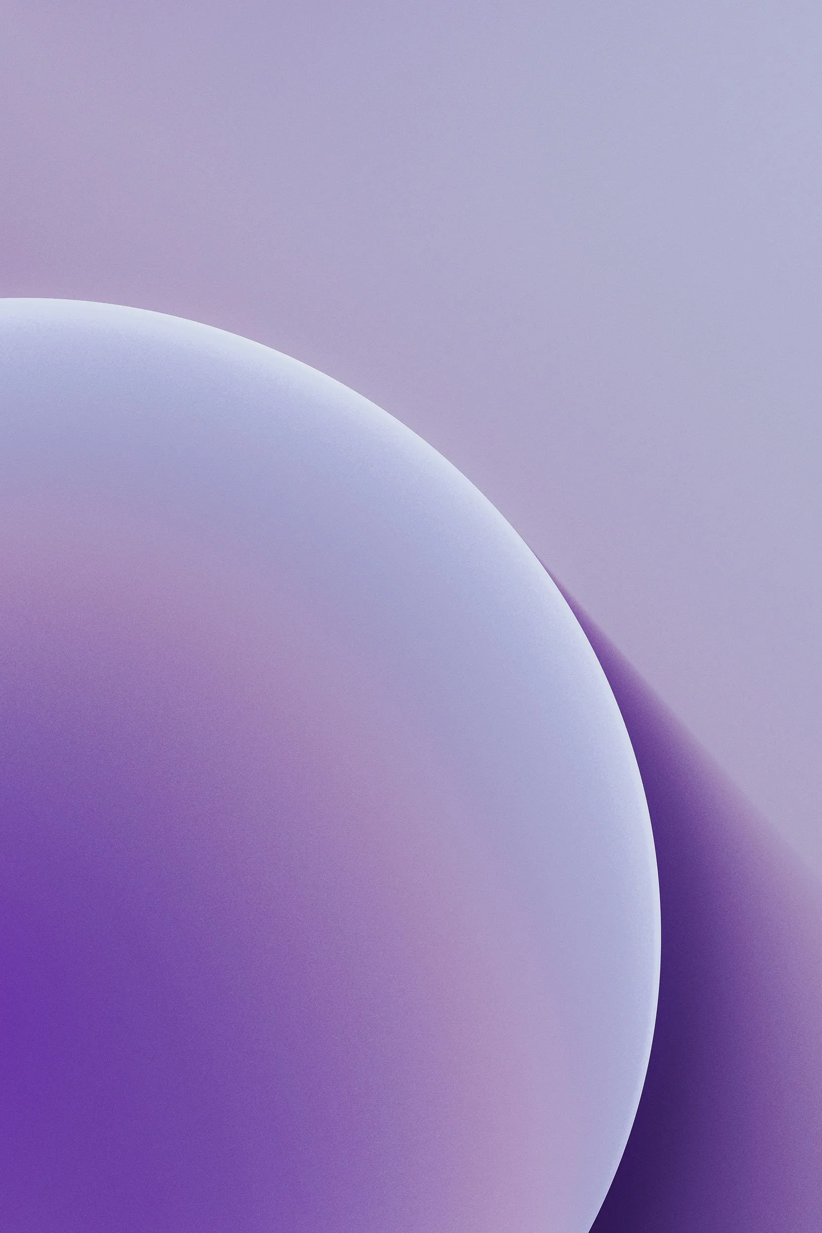 Close-up of a smooth, curved surface with a gradient background in shades of purple and blue.