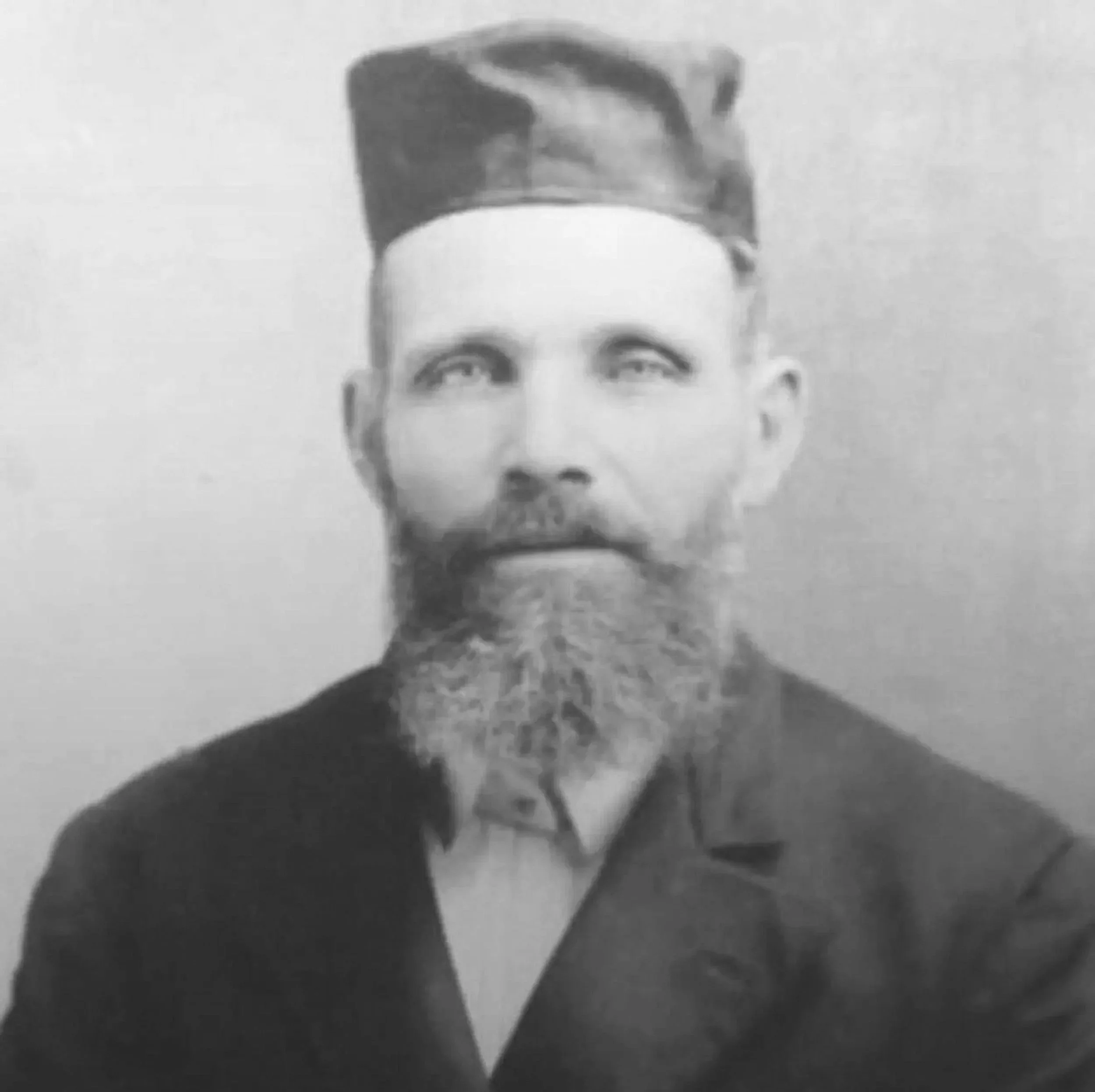Great Great Grandfather Mordecai black and white with beard wearing hat