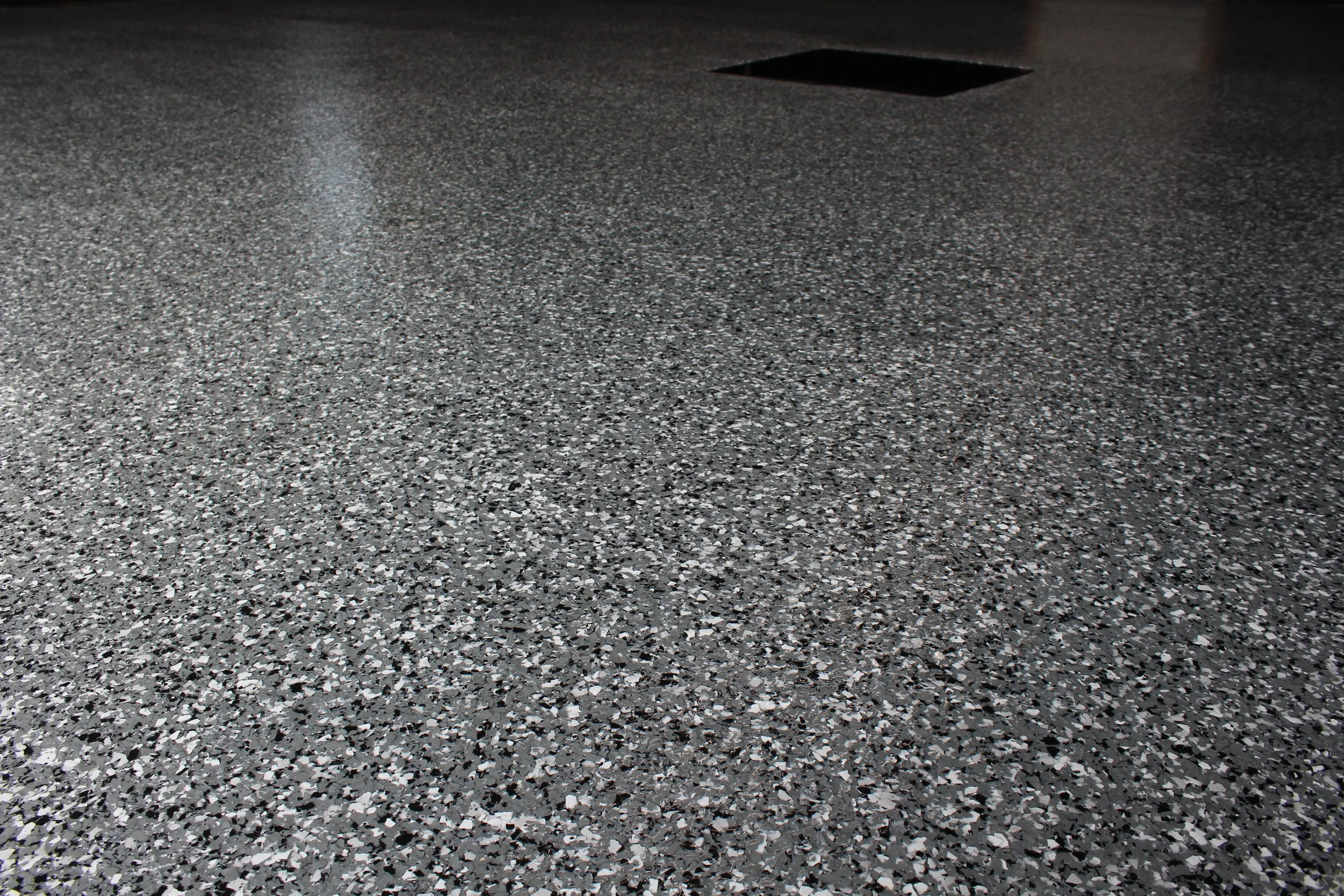 Professional epoxy garage floor coating Iowa City Iowa by ProTek Surface Systems