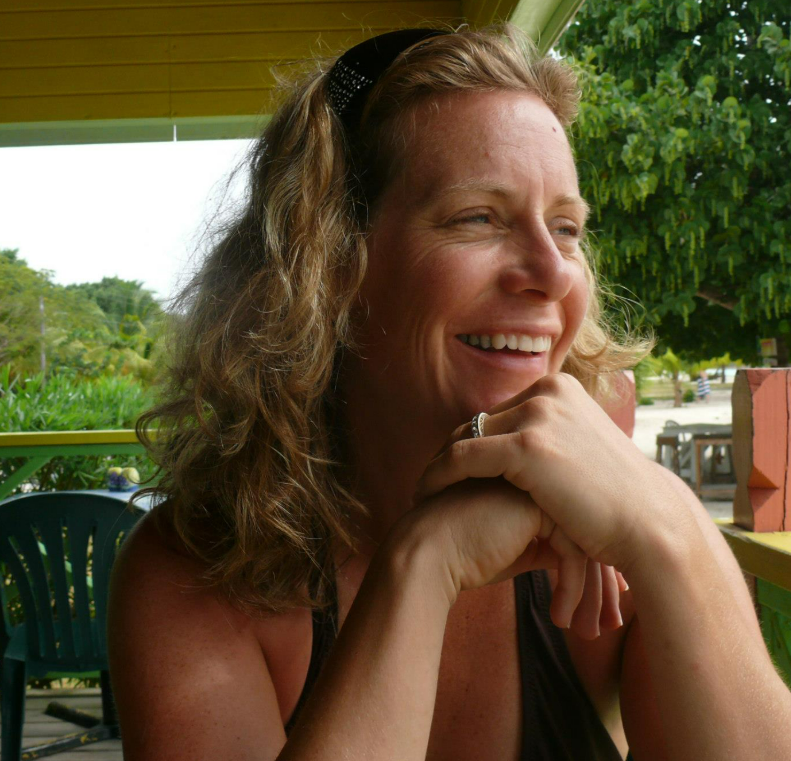 Artist Gabrielle England smiling outdoors in natural light