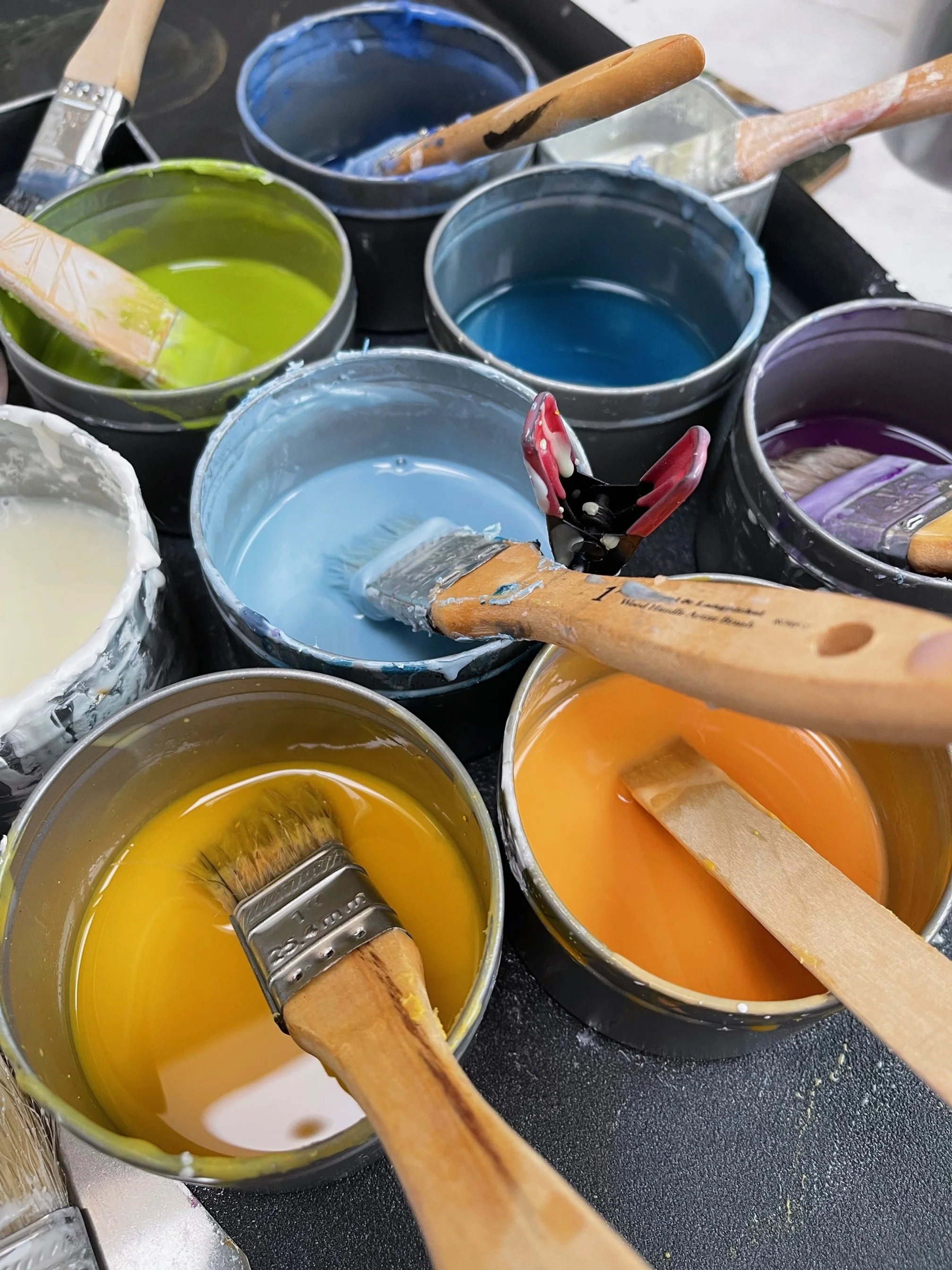 Encaustic paint tins in Gabrielle England's studio