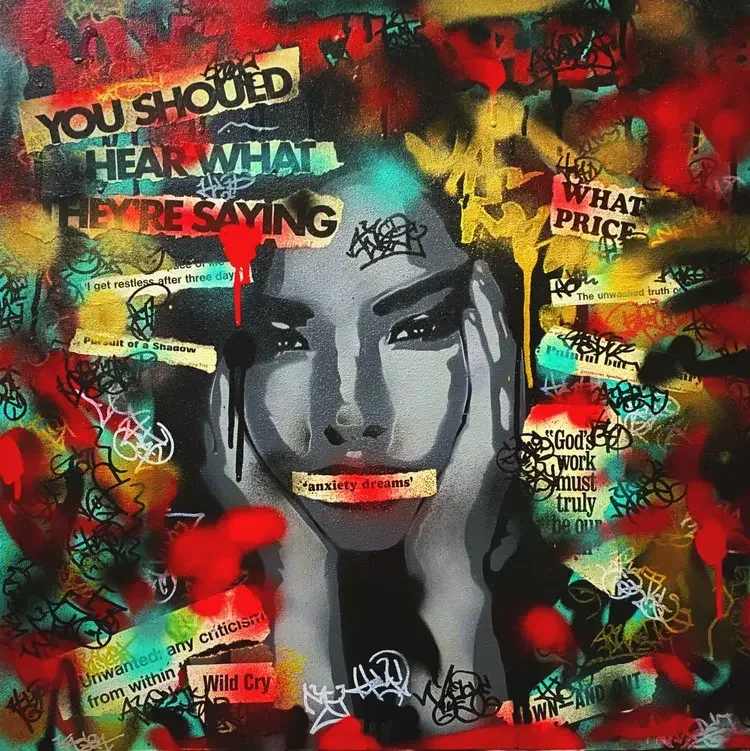 Graffiti-style artwork of a woman's face with various spray-painted phrases and abstract designs surrounding her.