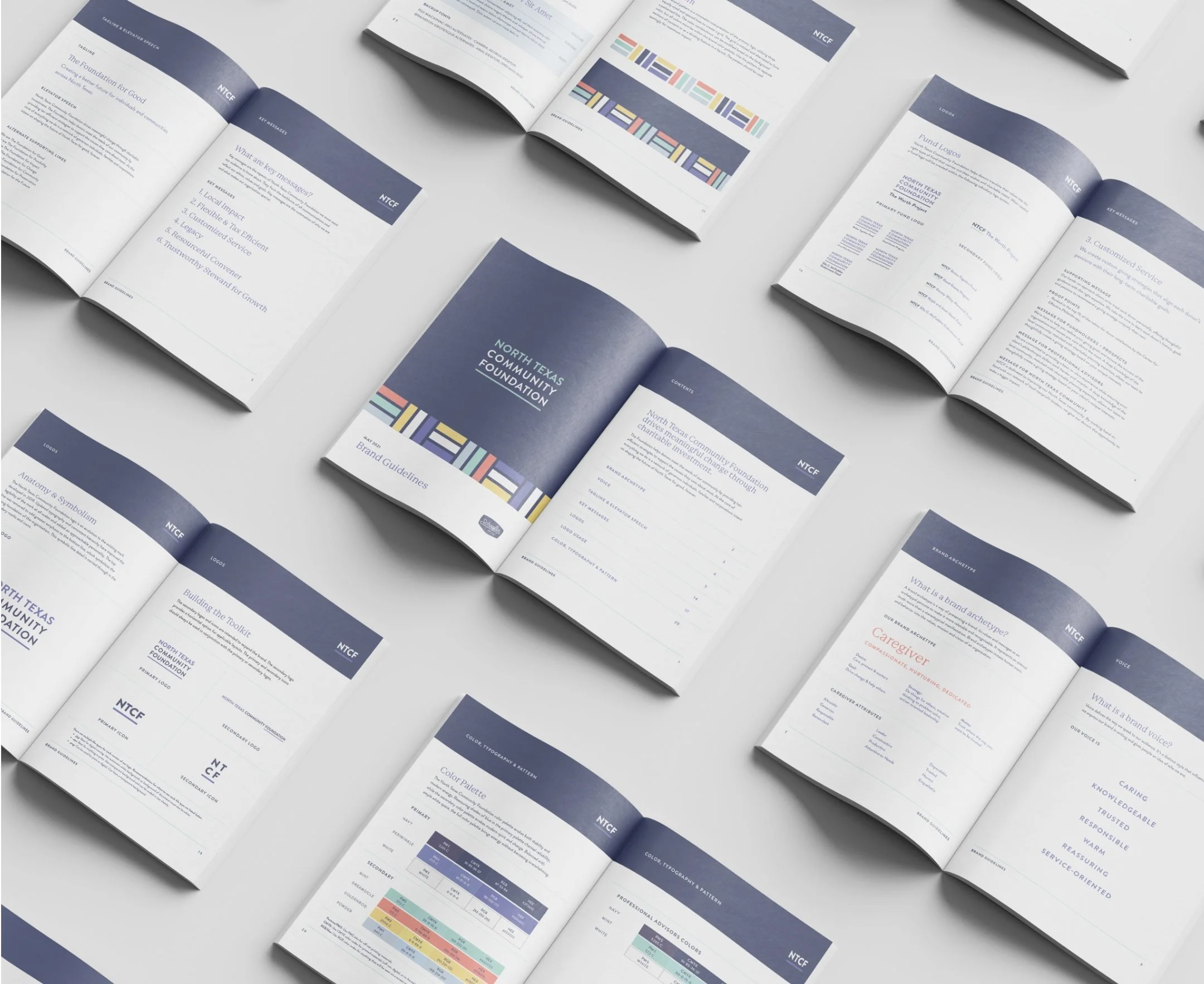 Open brand guideline booklets for North Texas Community Foundation, featuring pages with logos, brand attributes, color palette, and key messages, arranged on a white table.