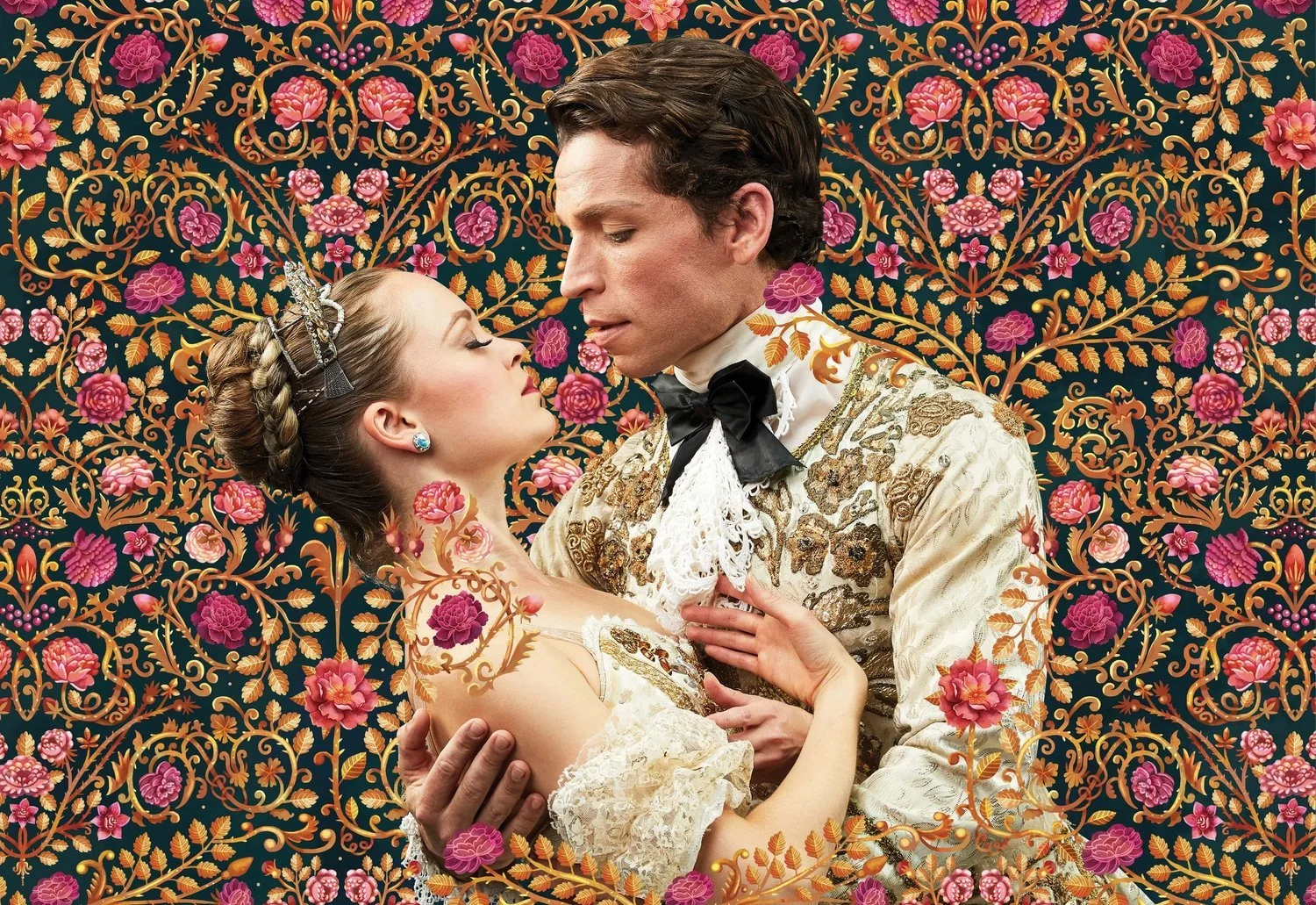 A woman and man dressed in elaborate, vintage-style clothing, embracing against an intricate floral background with pink and purple flowers and golden vines.