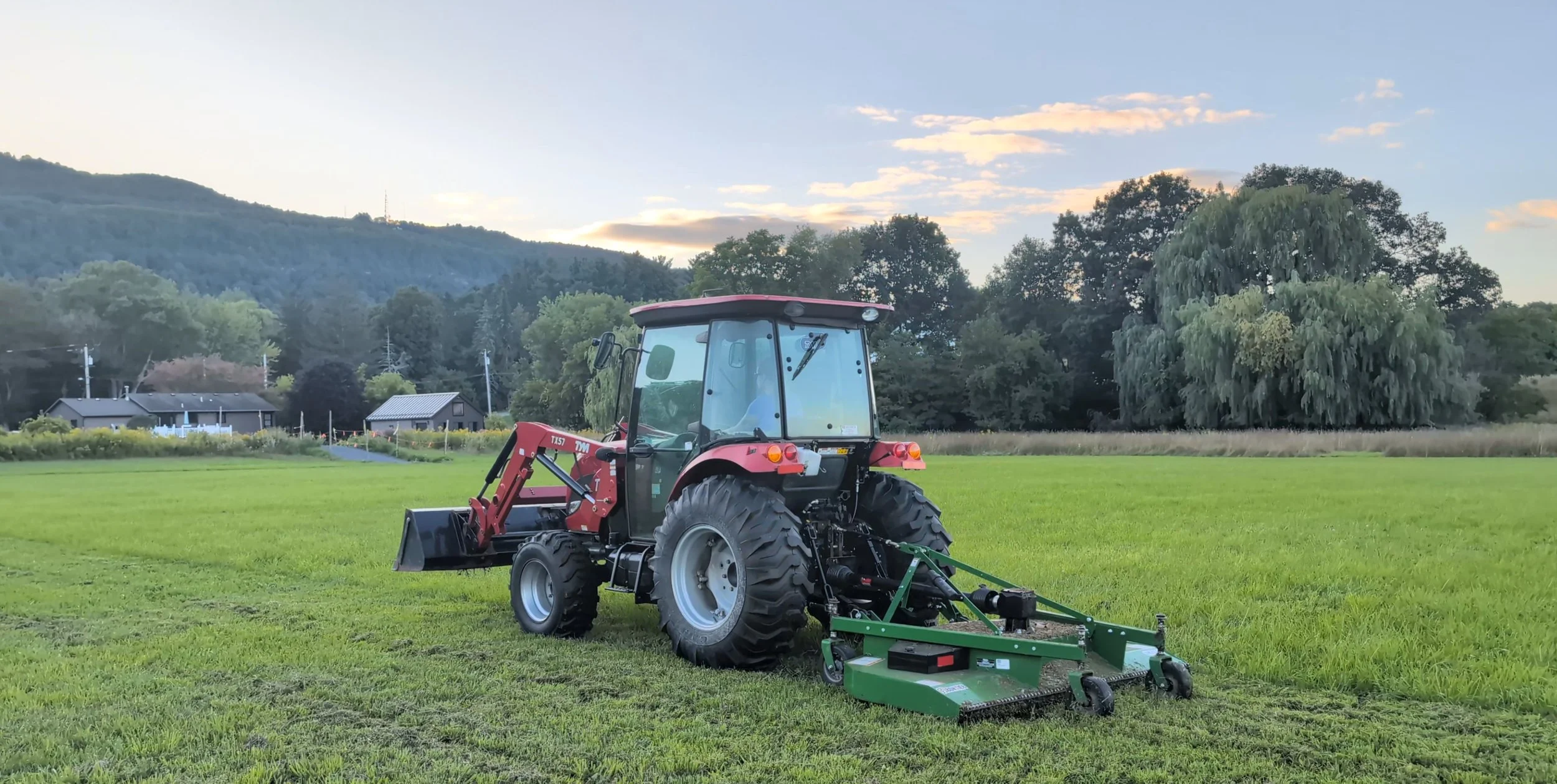 Mowing Selene Meadow Farm.jpg