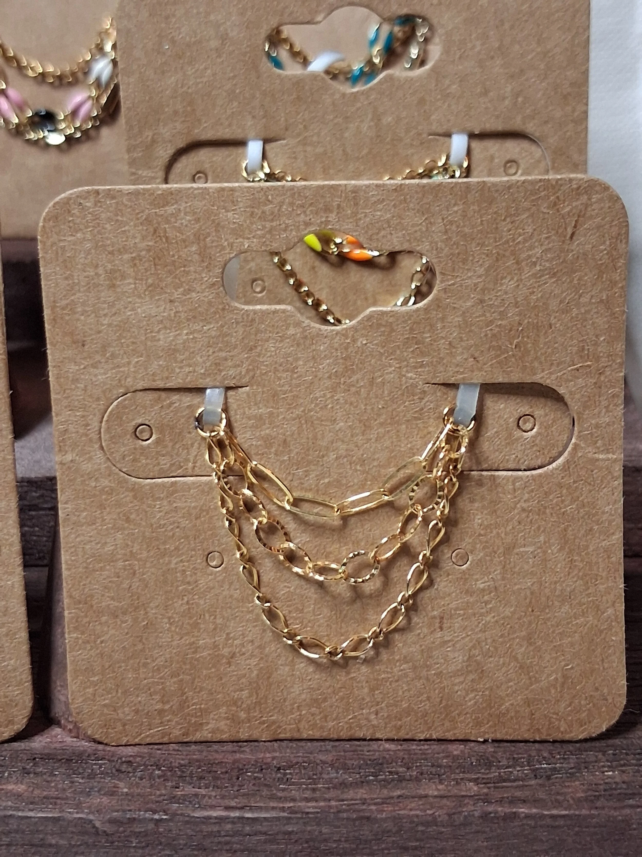 triple gold earring chains.jpg