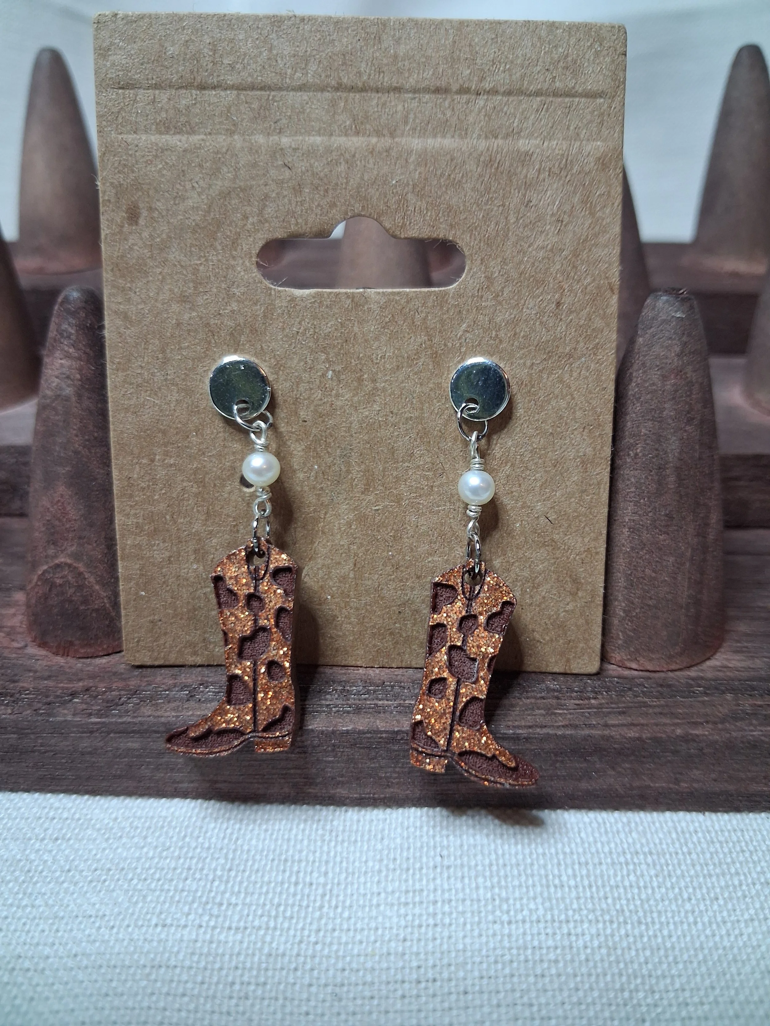 cowboy bott earrings.jpg
