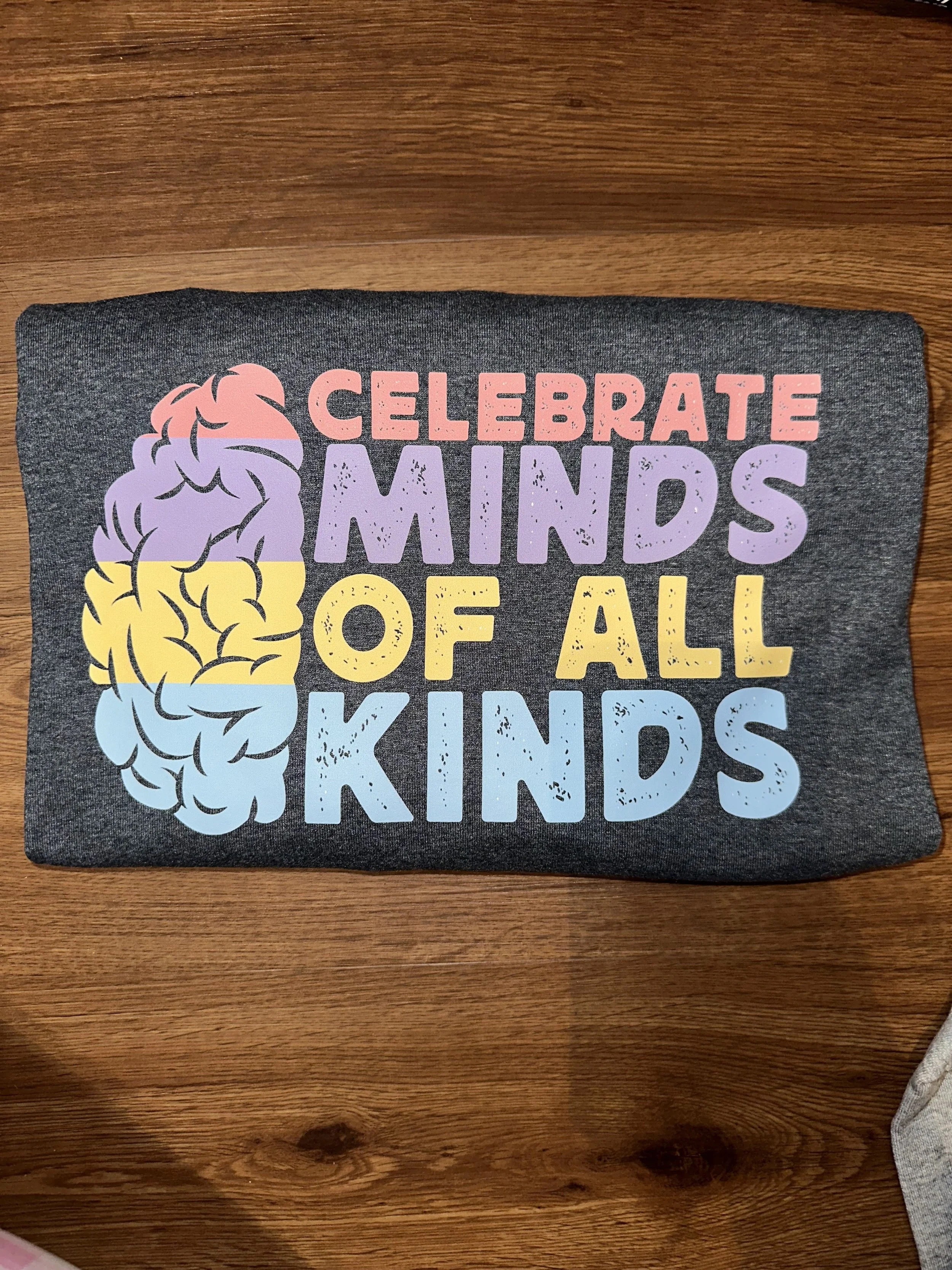 celecrate minds dark grey.jpeg