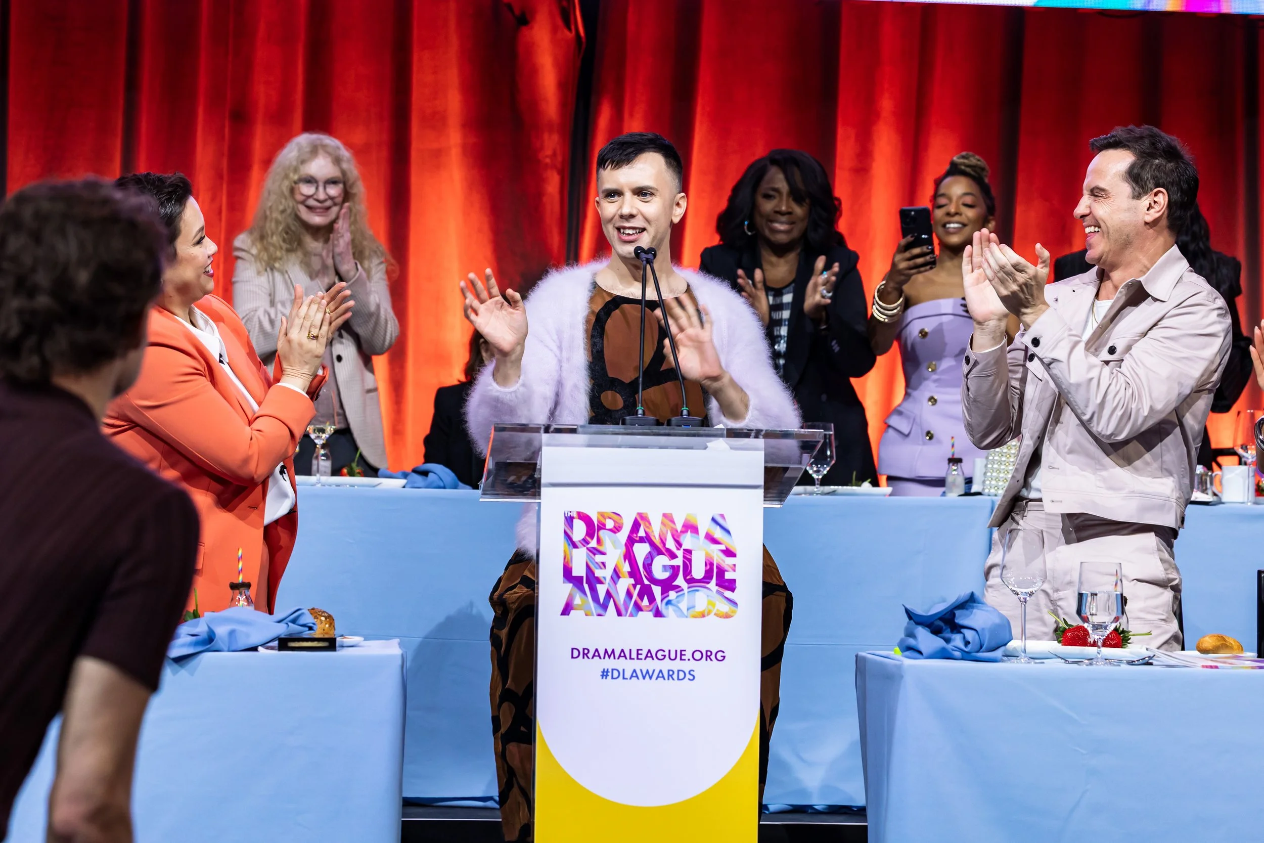 Cole Escola accepting an award at the Drama League Awards Luncheon. 