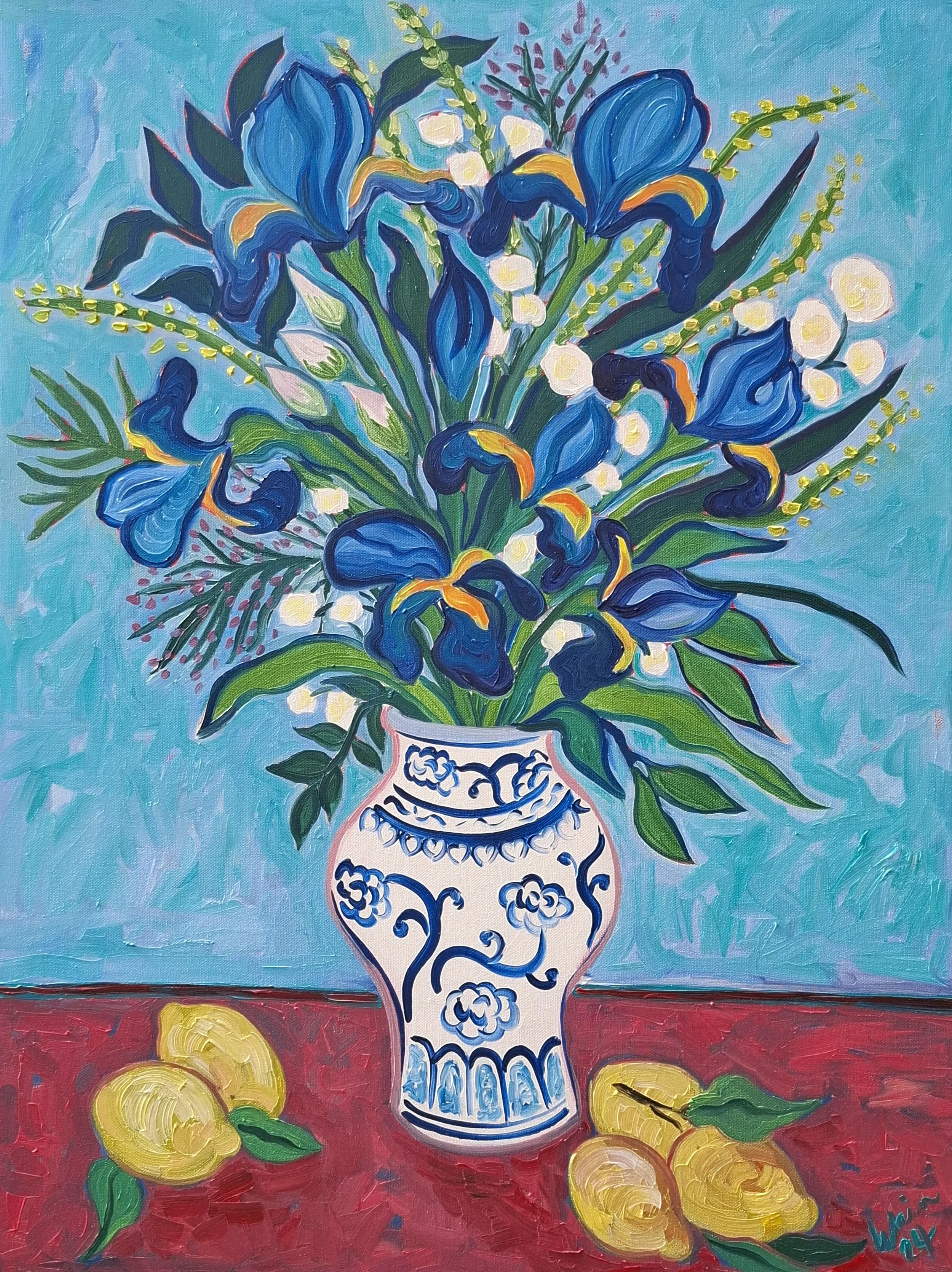 Painting of a blue iris flower bouquet in a decorative white and blue vase, with three yellow lemons on a red surface.