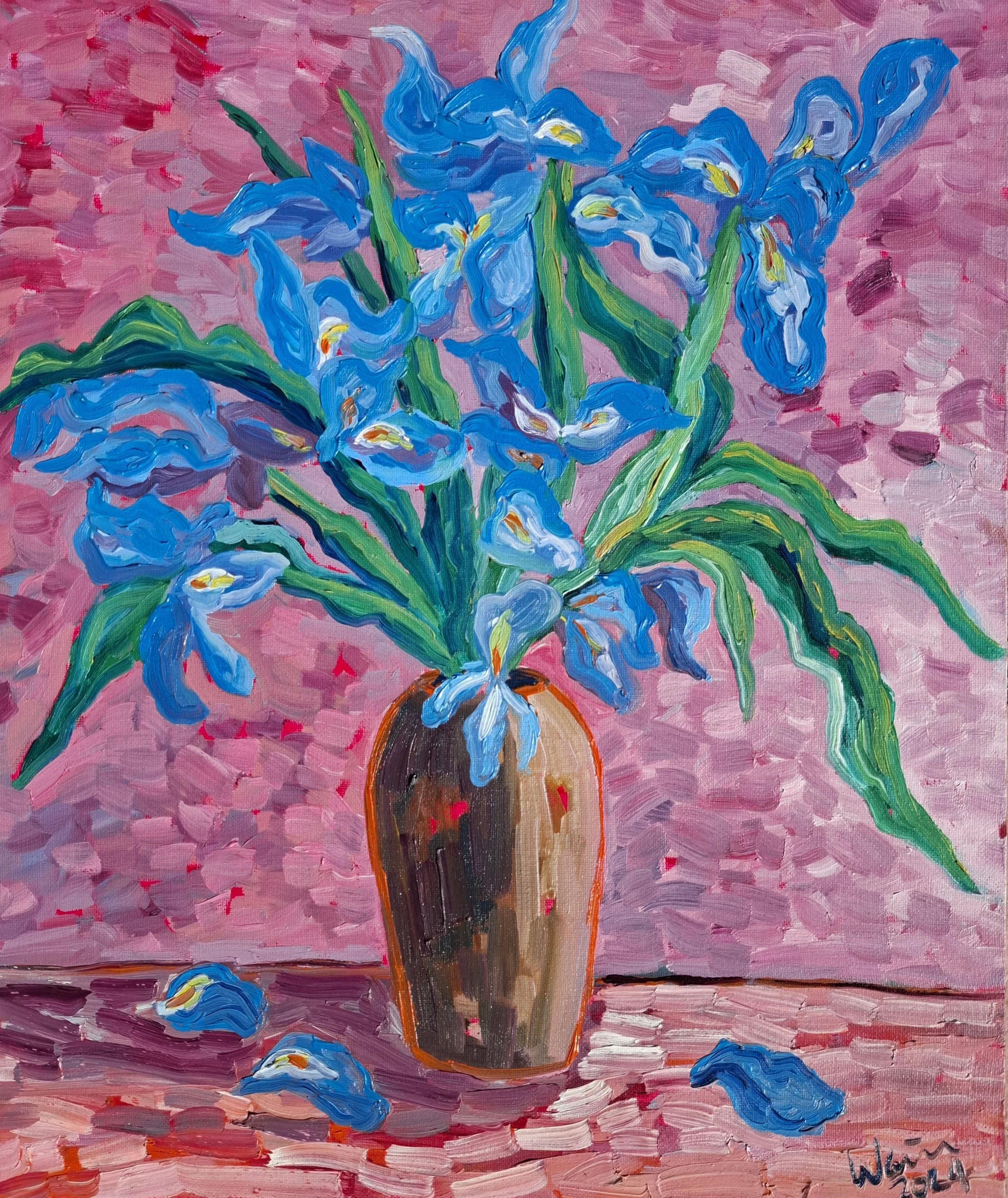 A painting of a bouquet of blue irises in a brown vase on a pink background with a pink surface. Some flowers are fallen around the vase.