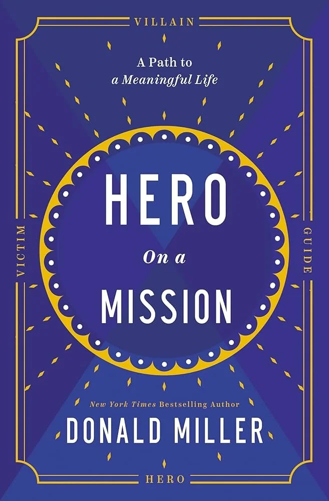 Book cover for 'Hero on a Mission' by Donald Miller. The cover features a blue background with yellow and white accents, including a large circular design with the title prominently displayed.