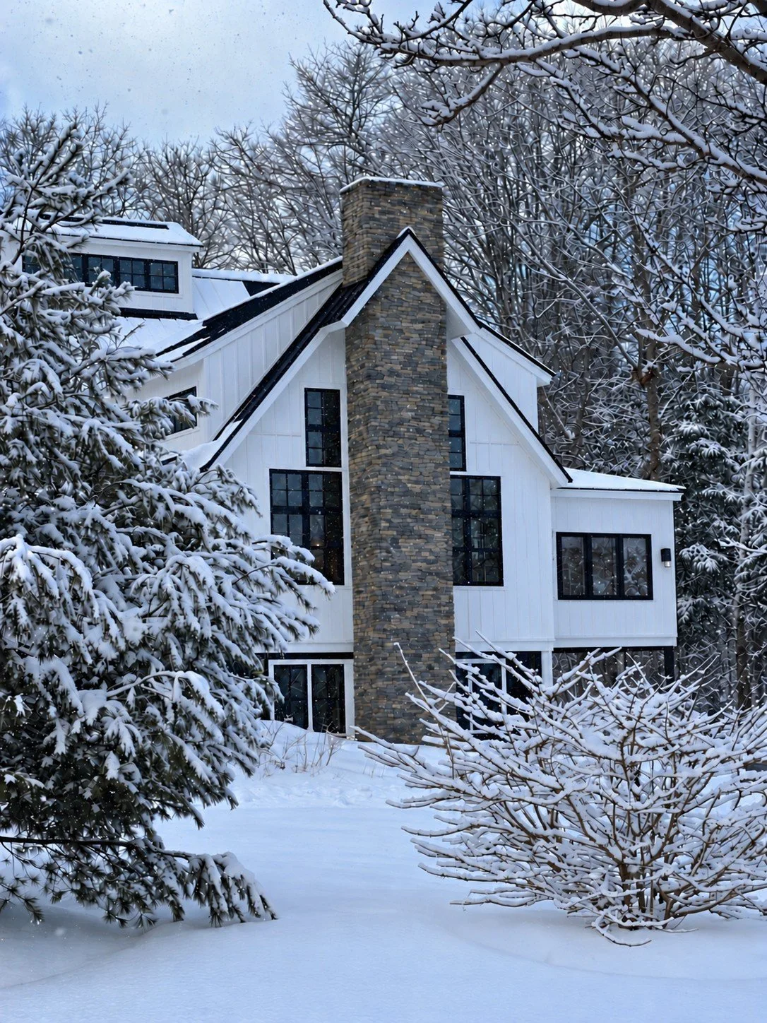 modern_farmouse_stone_chimney.jpeg