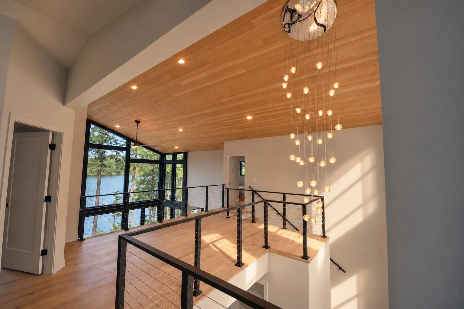 modern_lakehouse_loft_water_view.jpg