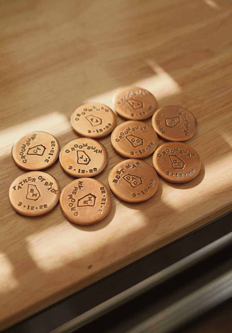 Copper ball markers made for a wedding party