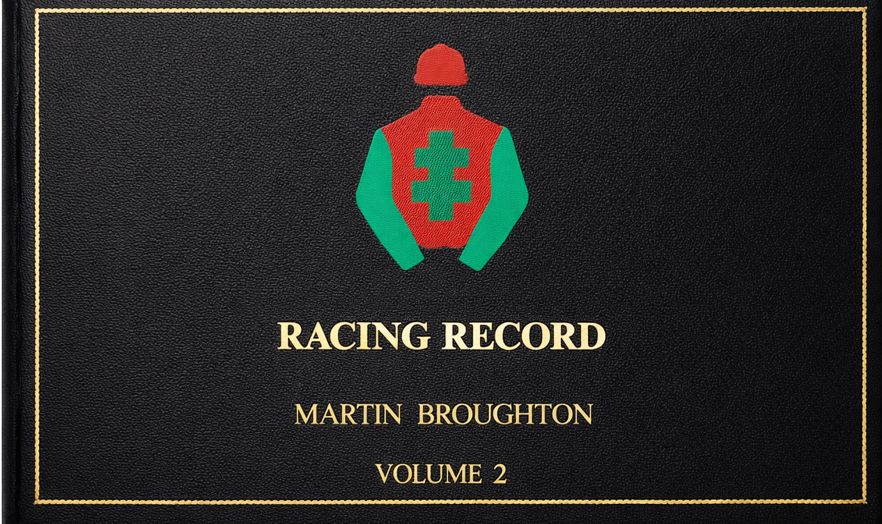 A black cover with gold trim and text, featuring an illustration of a jockey wearing a rescue helmet and vest with a medical cross, and the text 'RACING RECORD MARTIN BROUGHTON VOLUME 2'.