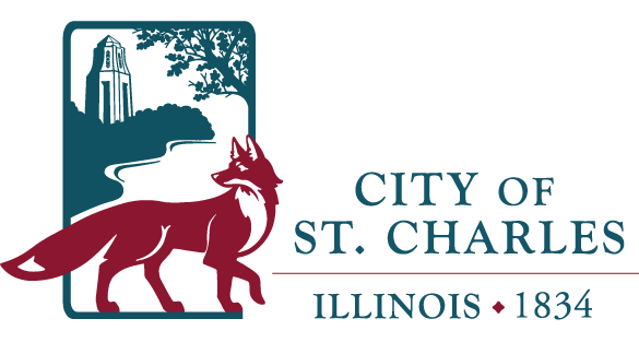 Logo of the City of St. Charles, Illinois, featuring a fox, a river, trees, and a tower, with the text 'City of St. Charles Illinois 1834'.