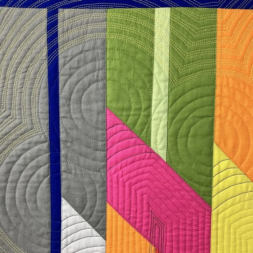 Quilting detail highlighting the halos.