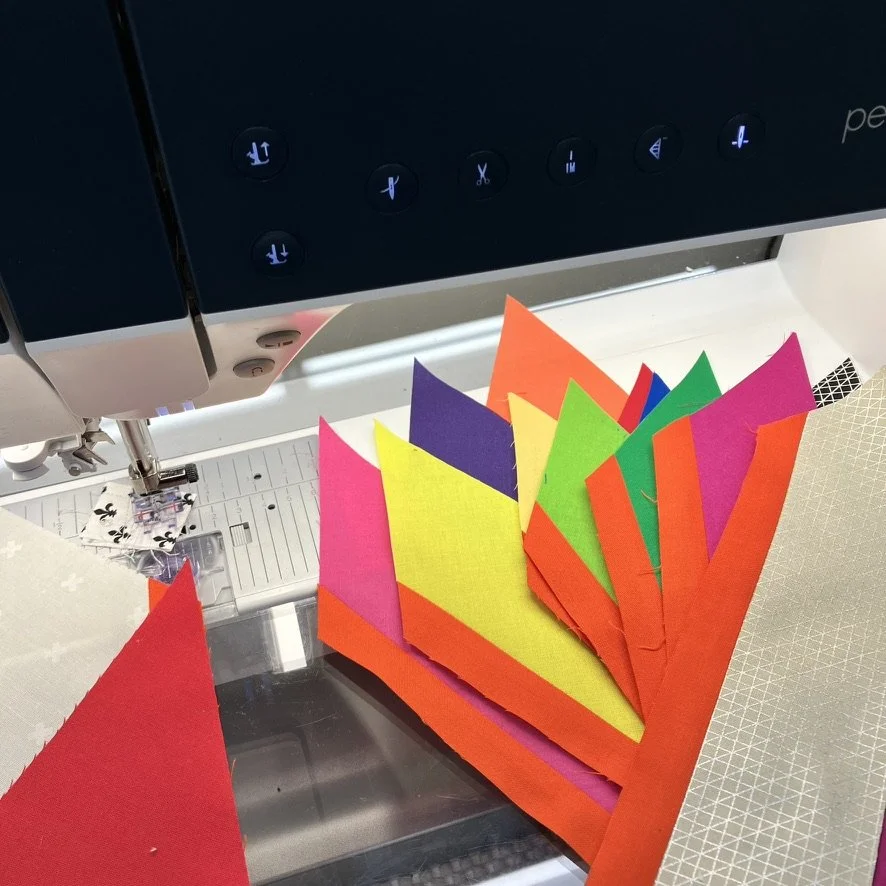 Action shot of the piecing process during the construction of Descent into Chaos.