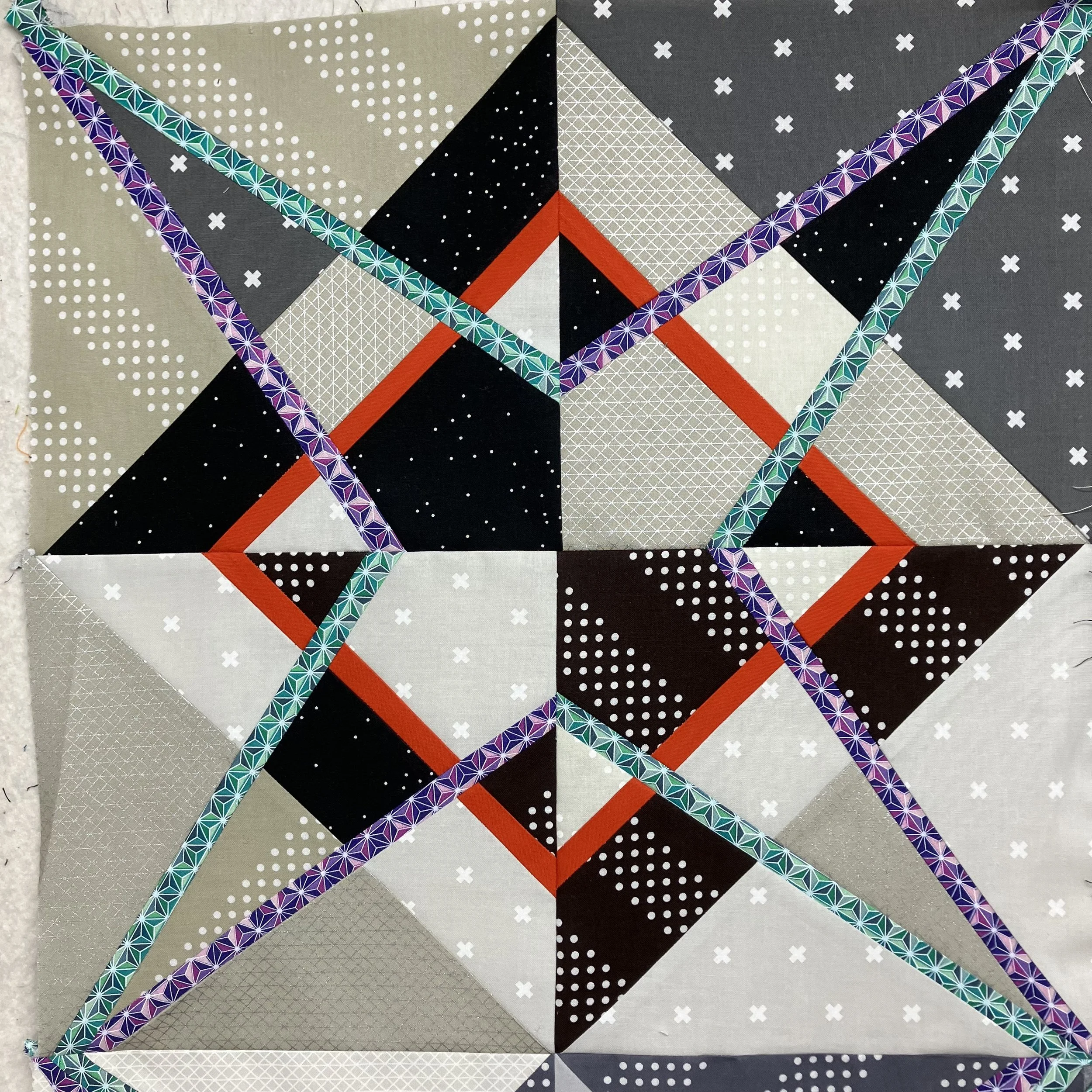 The first improvisational block created for Descent into Chaos, which became the foundation for the entire quilt.