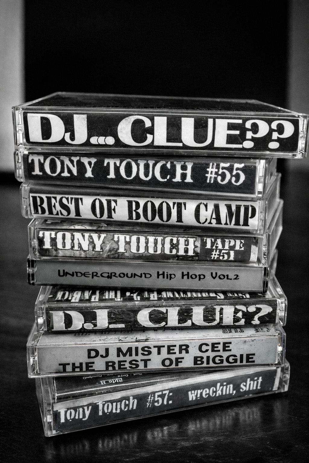 Stack of cassette tapes featuring DJ, Tony Touch, Boot Camp, underground hip hop, and Biggie music titles.
