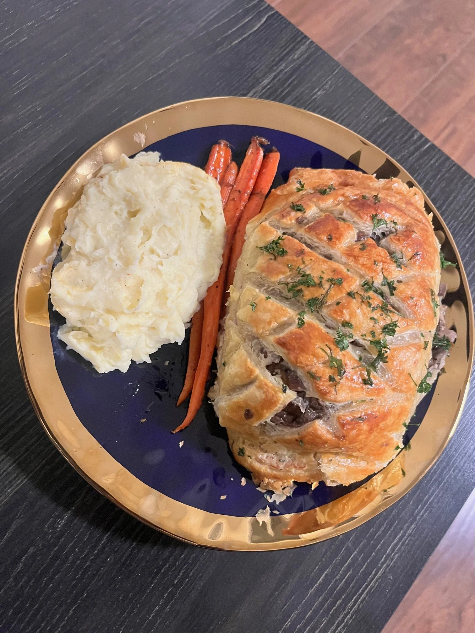 Elegant beef wellington entrée with buttery pastry and smooth potato purée, elevated dining at home in Kentucky