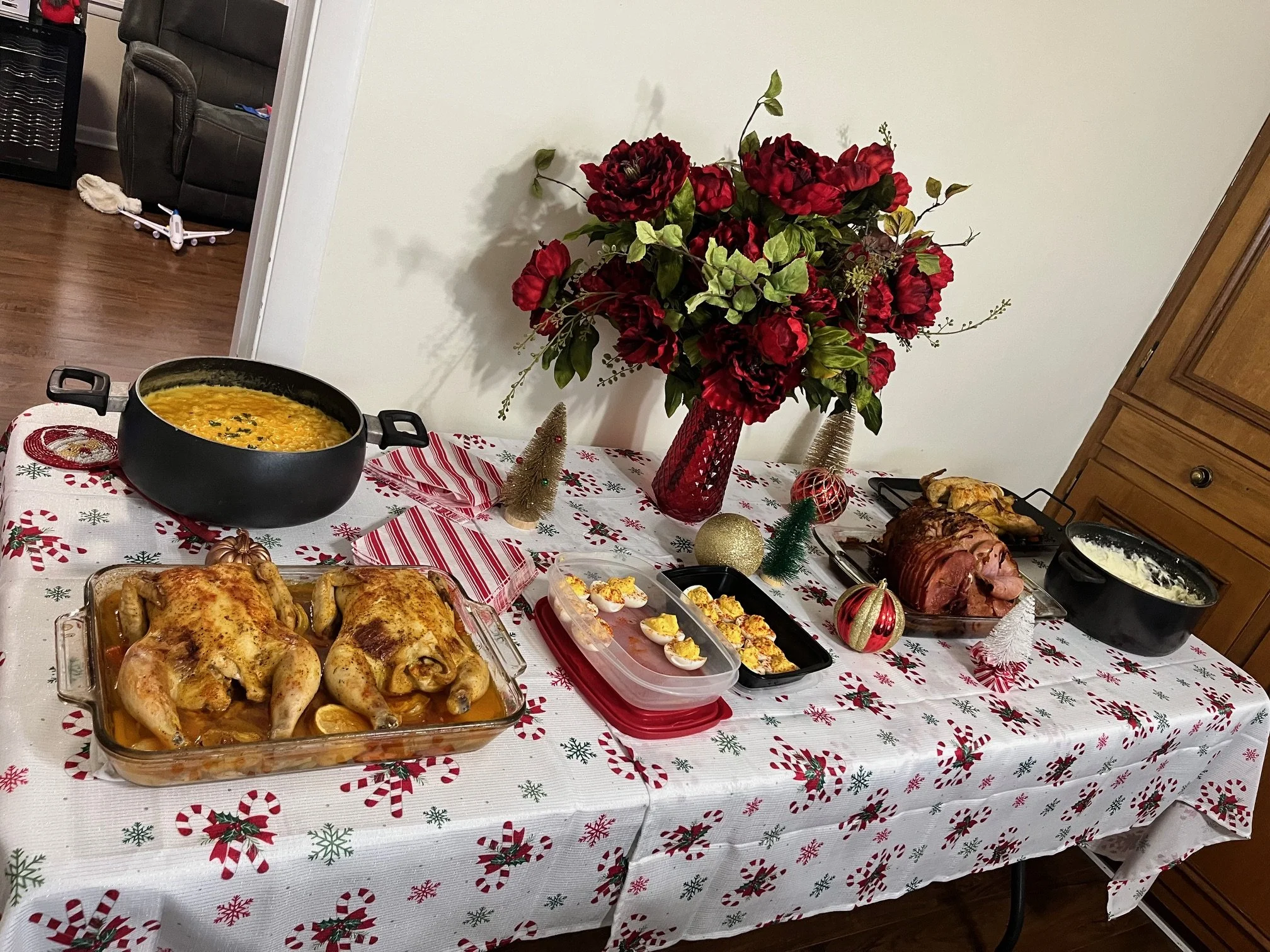 Elegant private dining table setup with curated dishes and floral centerpiece, in-home dining experience
