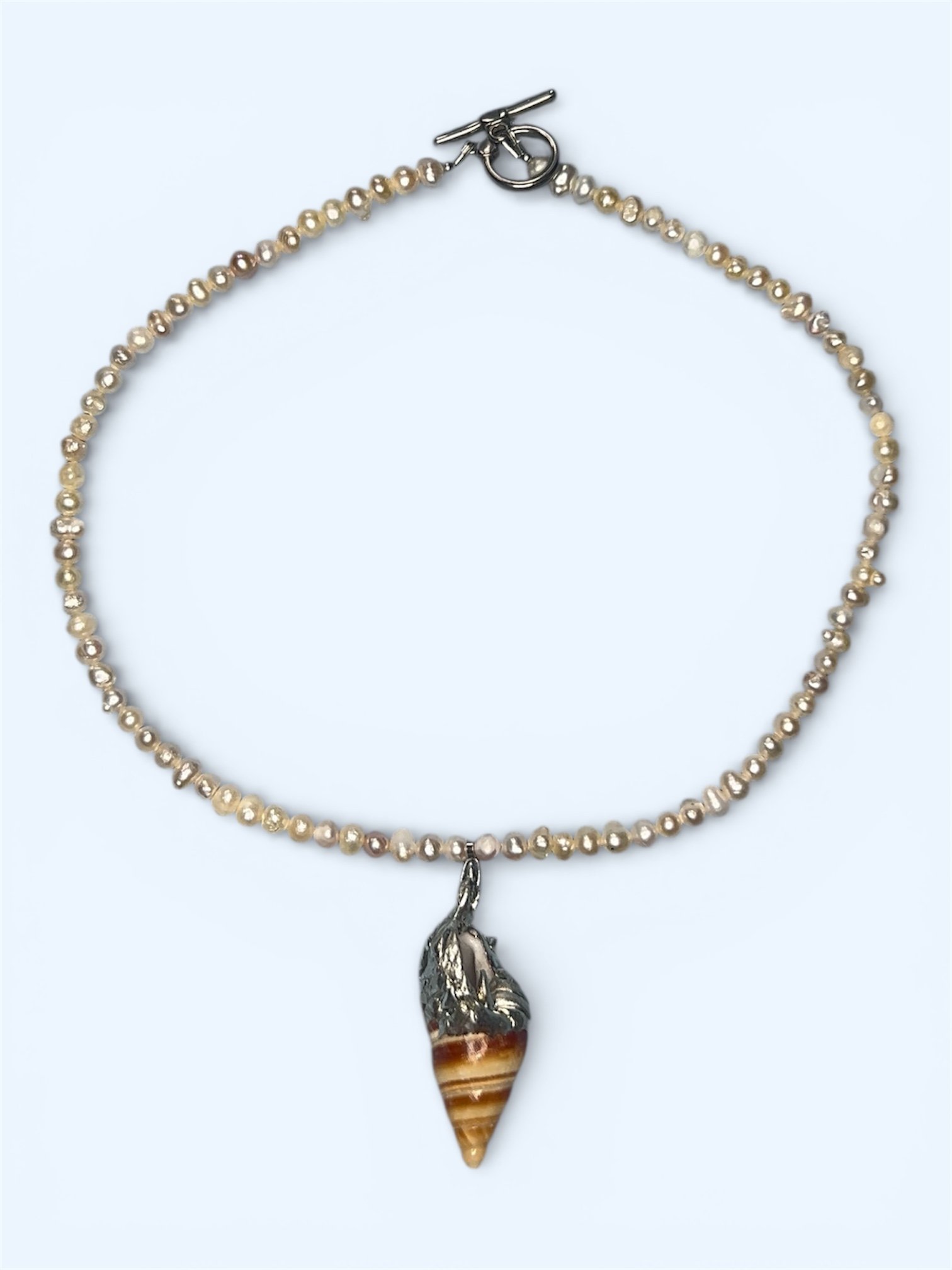 coneshellpearlnecklace.jpg