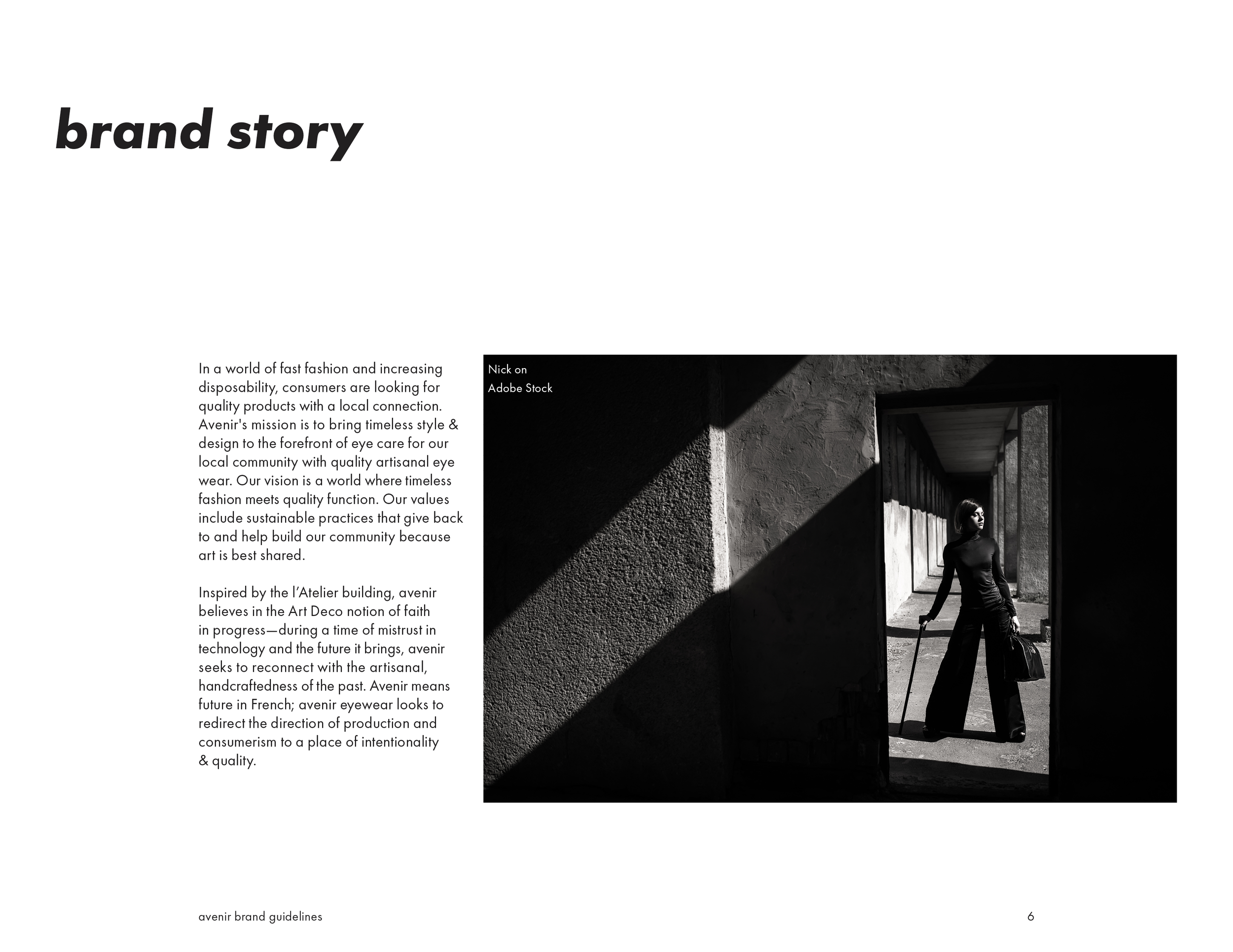 A black and white photo of a woman standing in a doorway with a rolling suitcase, looking to the side, with strong shadows cast on the wall beside her.