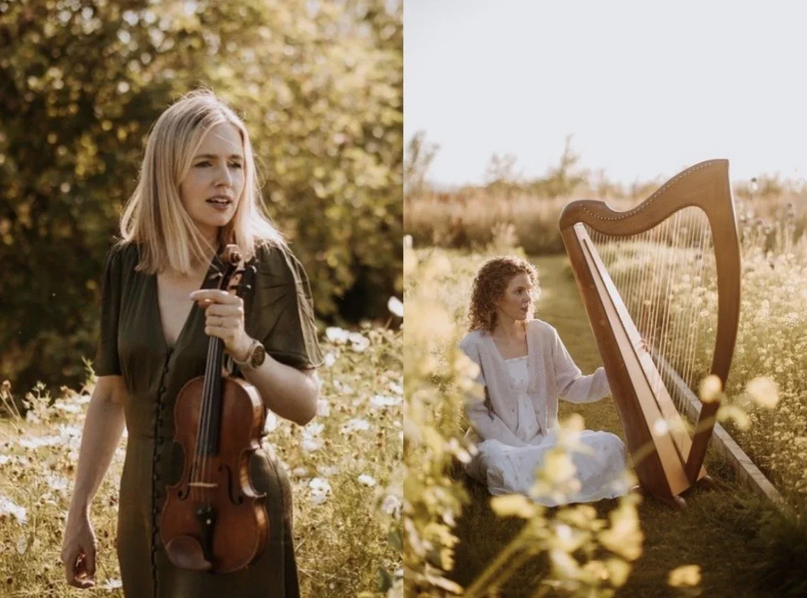 Woman with violin and another woman with a harp