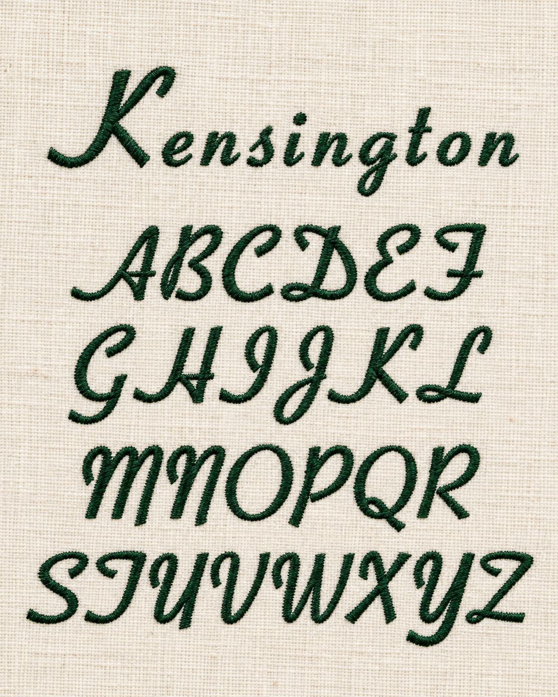 Embroidery of the alphabet in uppercase and lowercase letters on a beige fabric background.