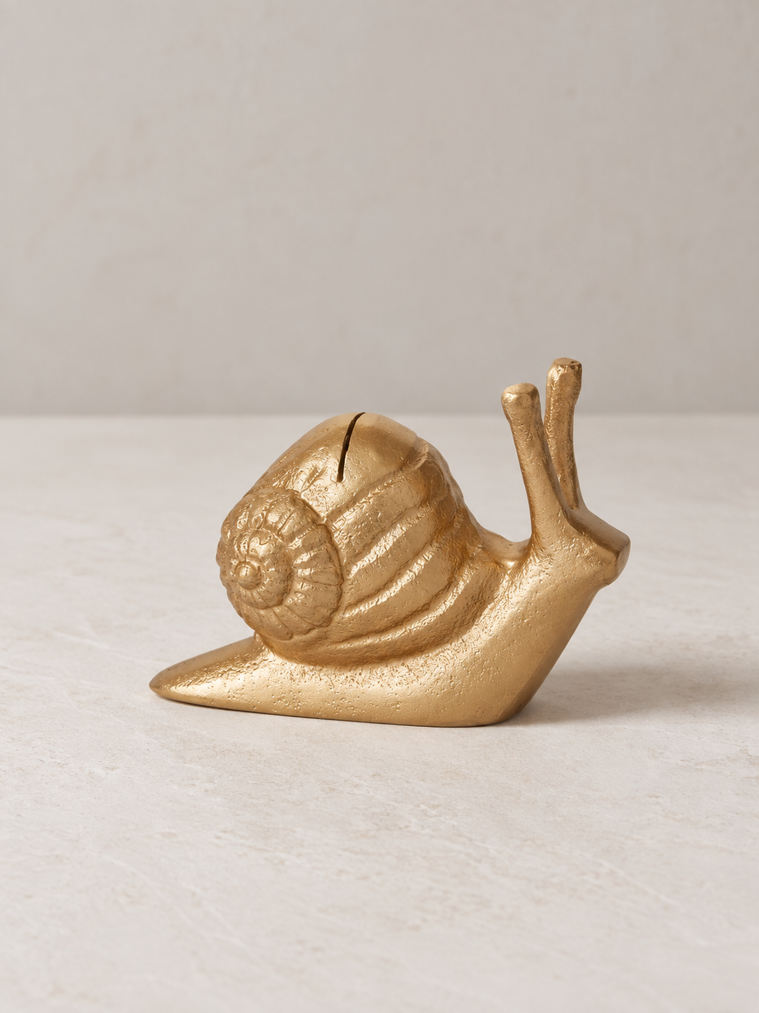 golden snail card holder.png