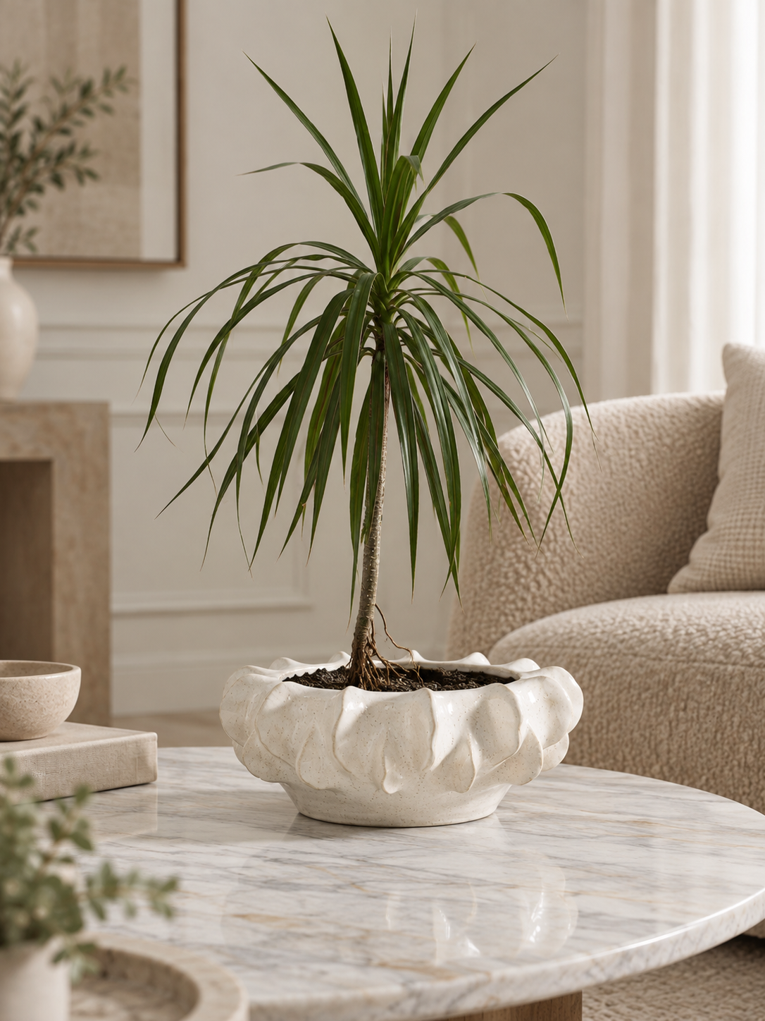 sculptural white bowl on marble.png