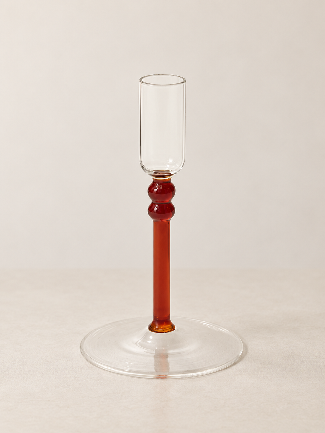 small amber lucasta candleholder.png
