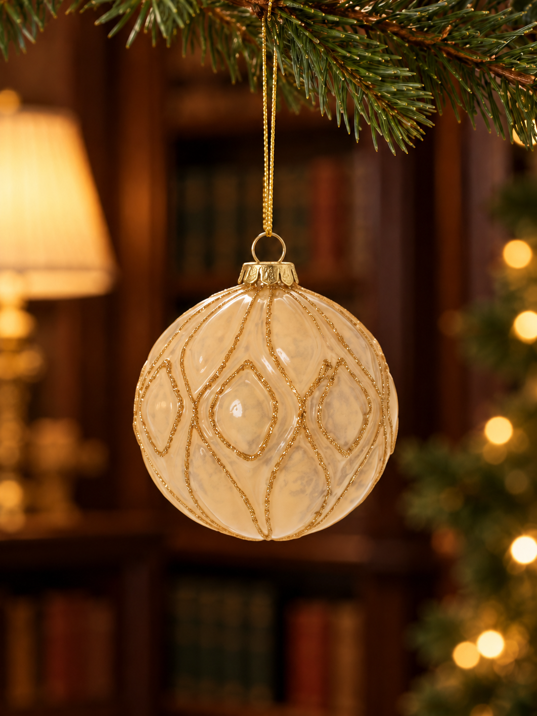 Champagne Antoinette Ornament in a Warm Library-2.png