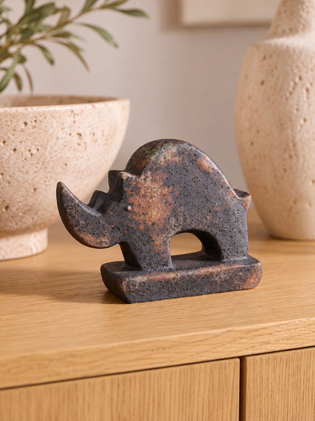 rhino ceramic desk sculpture.png