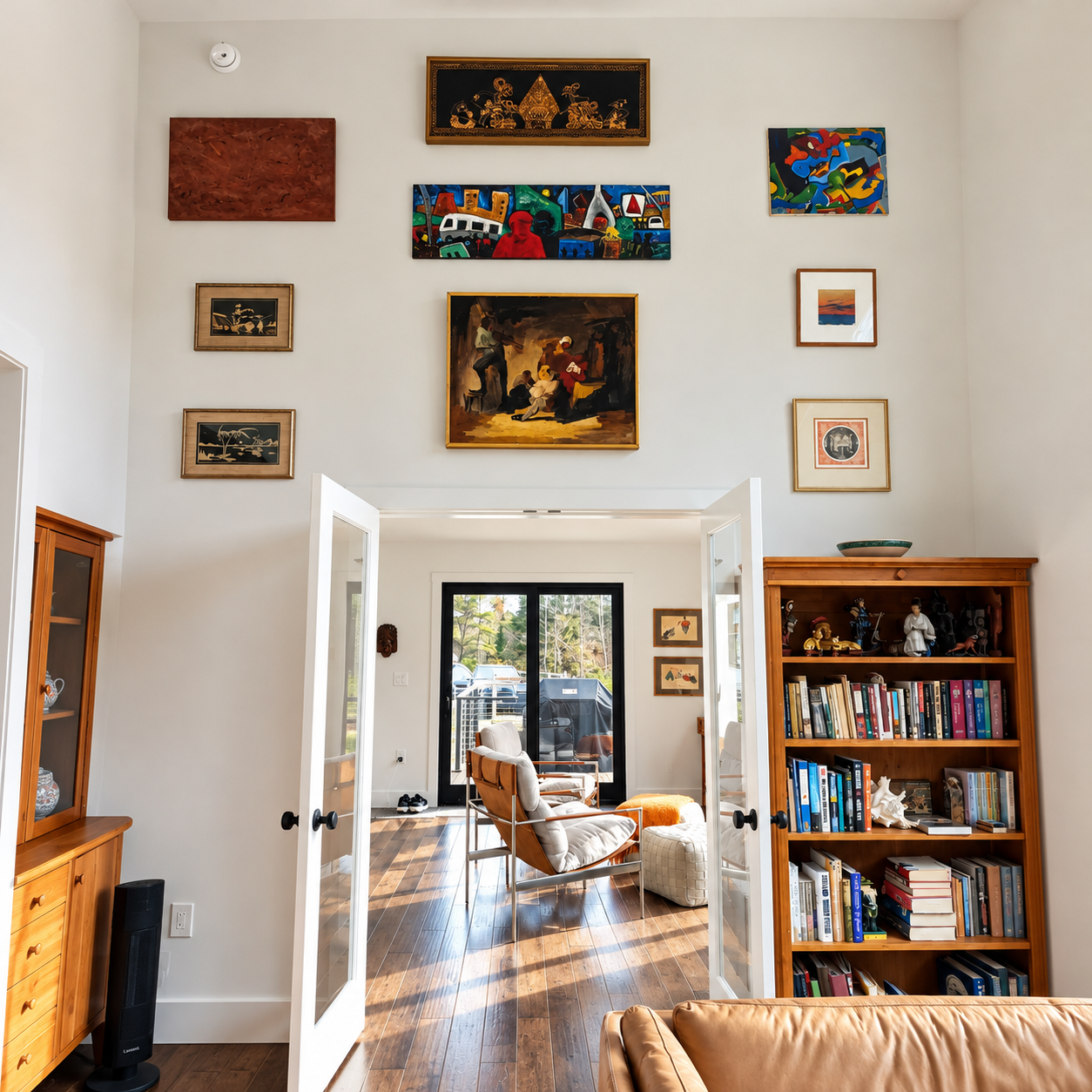 Art-Filled Living Room with Sunlit Patio View.png