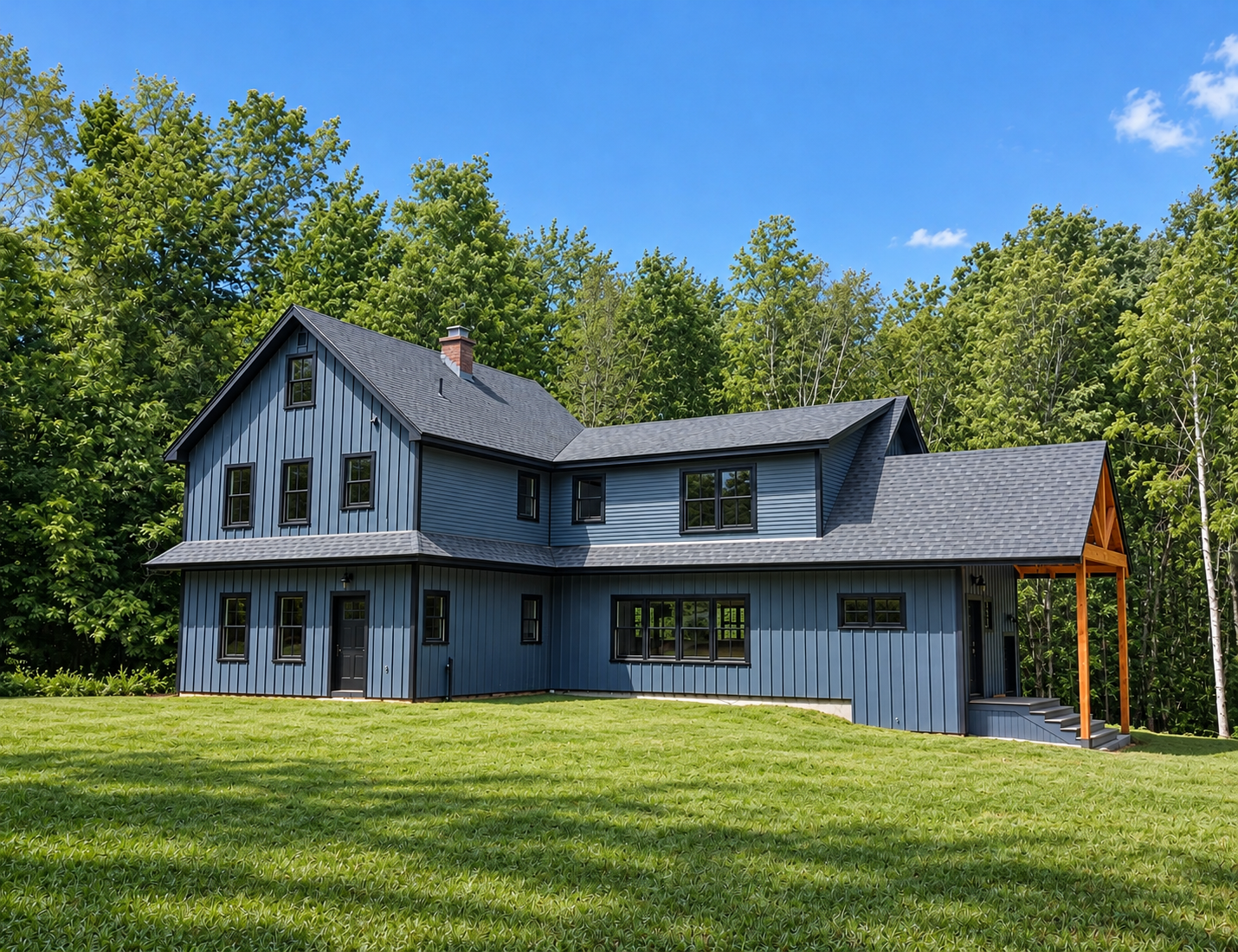 Modern Blue-Gray Farmhouse Amidst Greenery.png